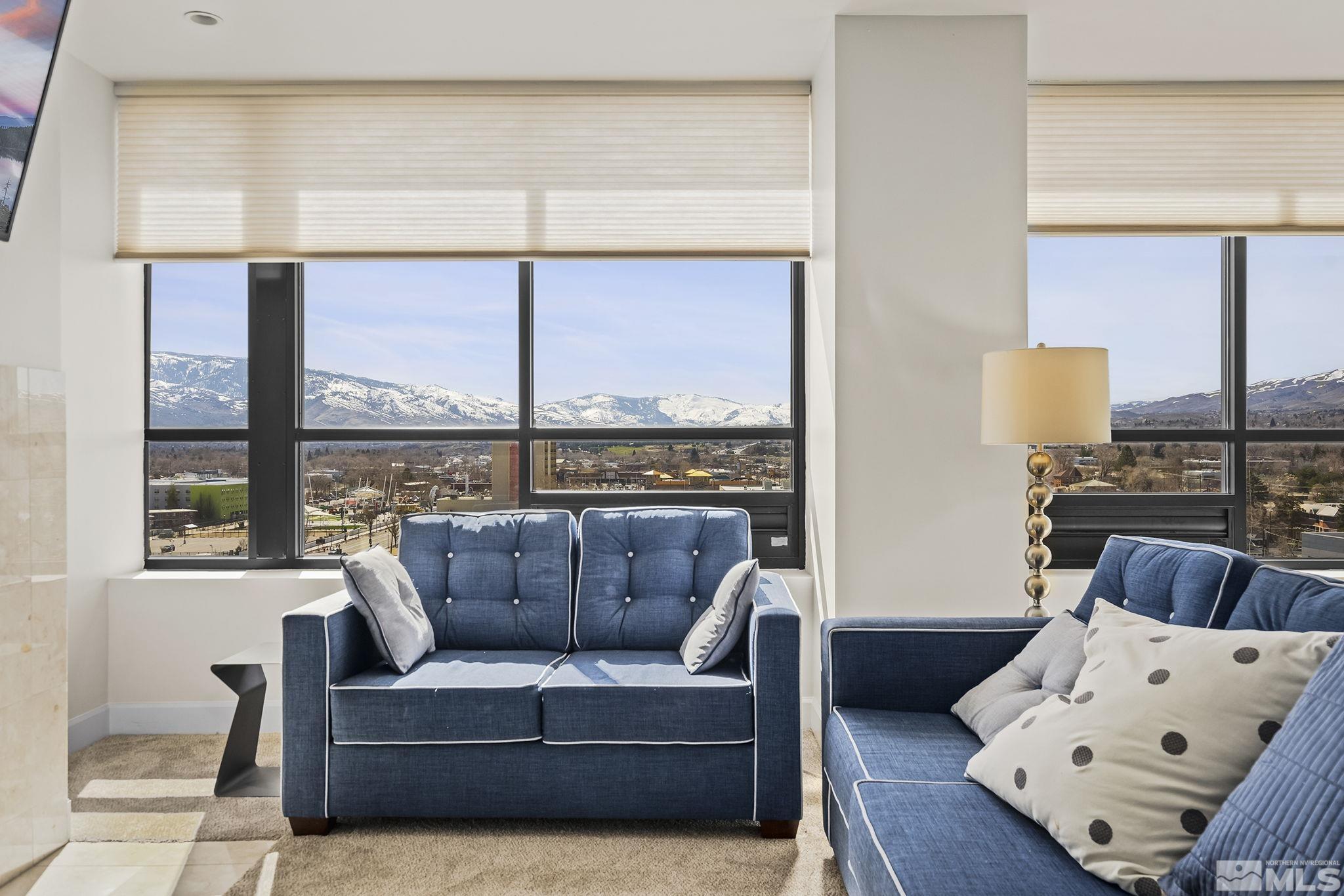 450 North Arlington Avenue, Unit 1207 Reno, NV 89503 - Photo 5 of 22 a living room with furniture and a large window