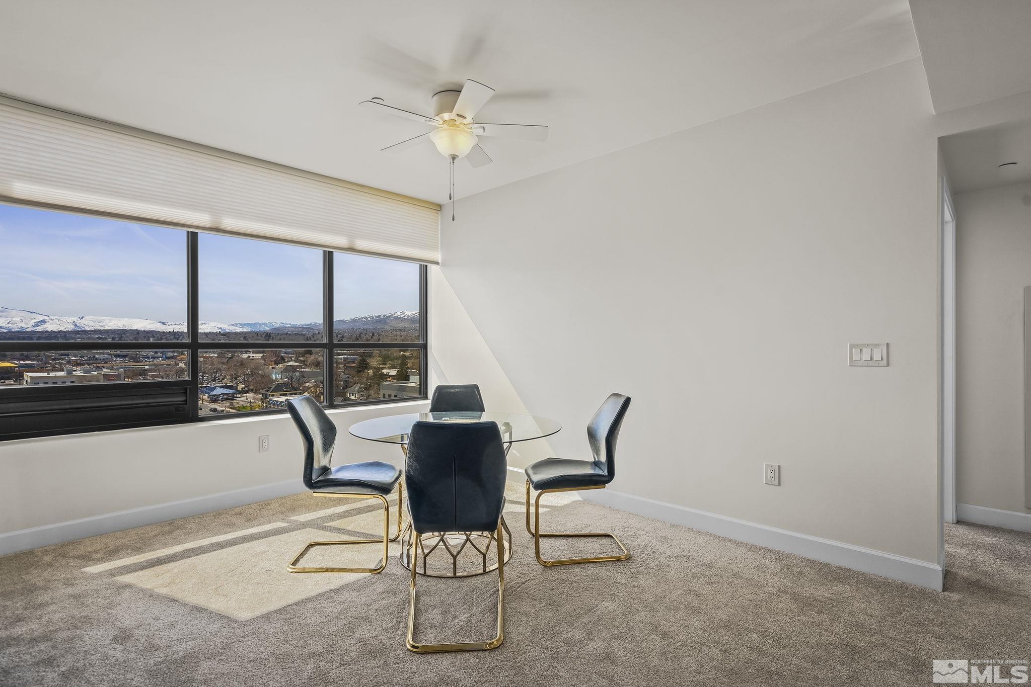 450 North Arlington Avenue, Unit 1207 Reno, NV 89503 - Photo 6 of 22 a view of a dining room with furniture window and outside view