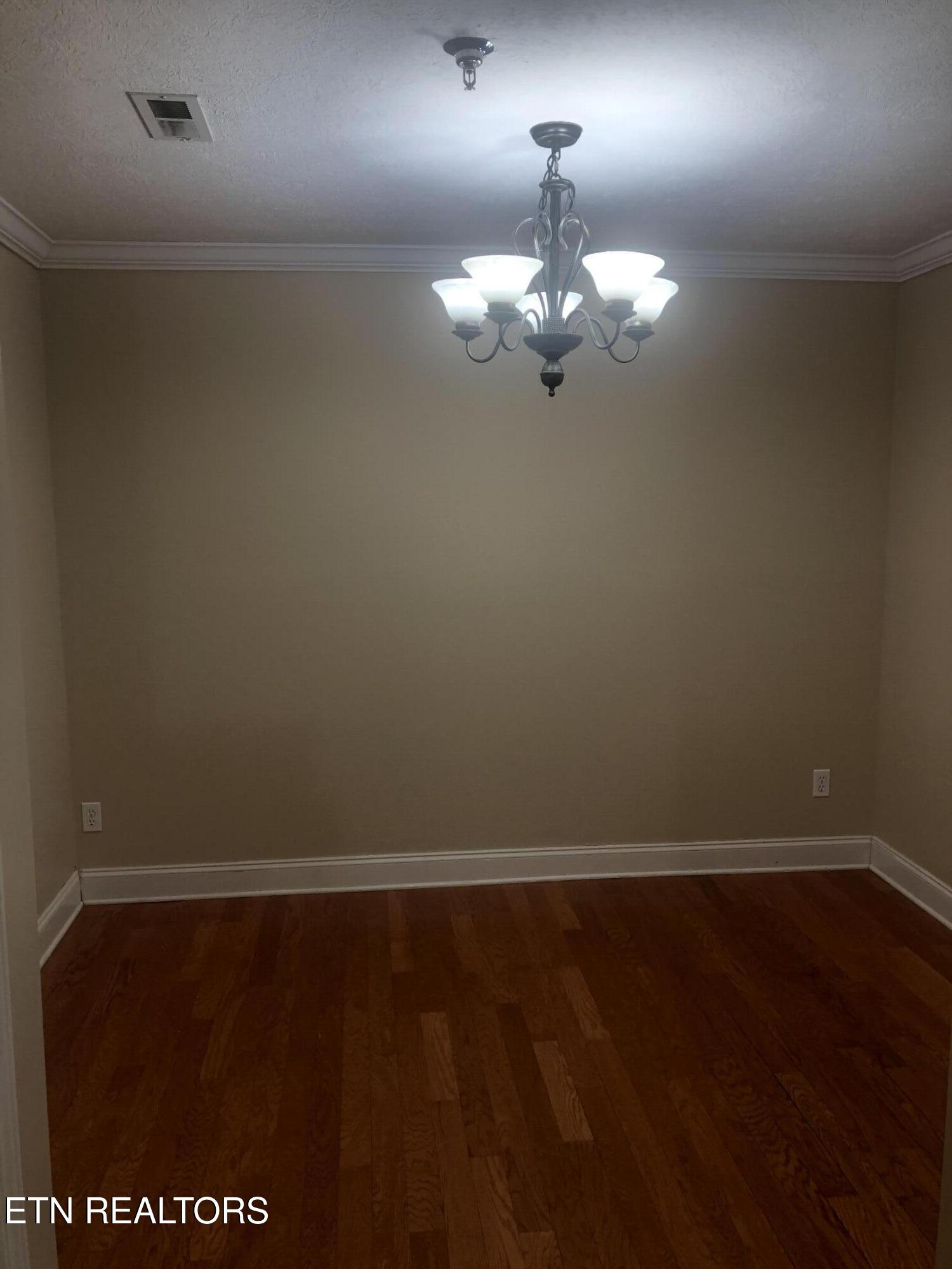 13 Ridgeway Road, Unit 2G Norris, TN 37828 - Photo 5 of 8 Dining Room with Wood Floors