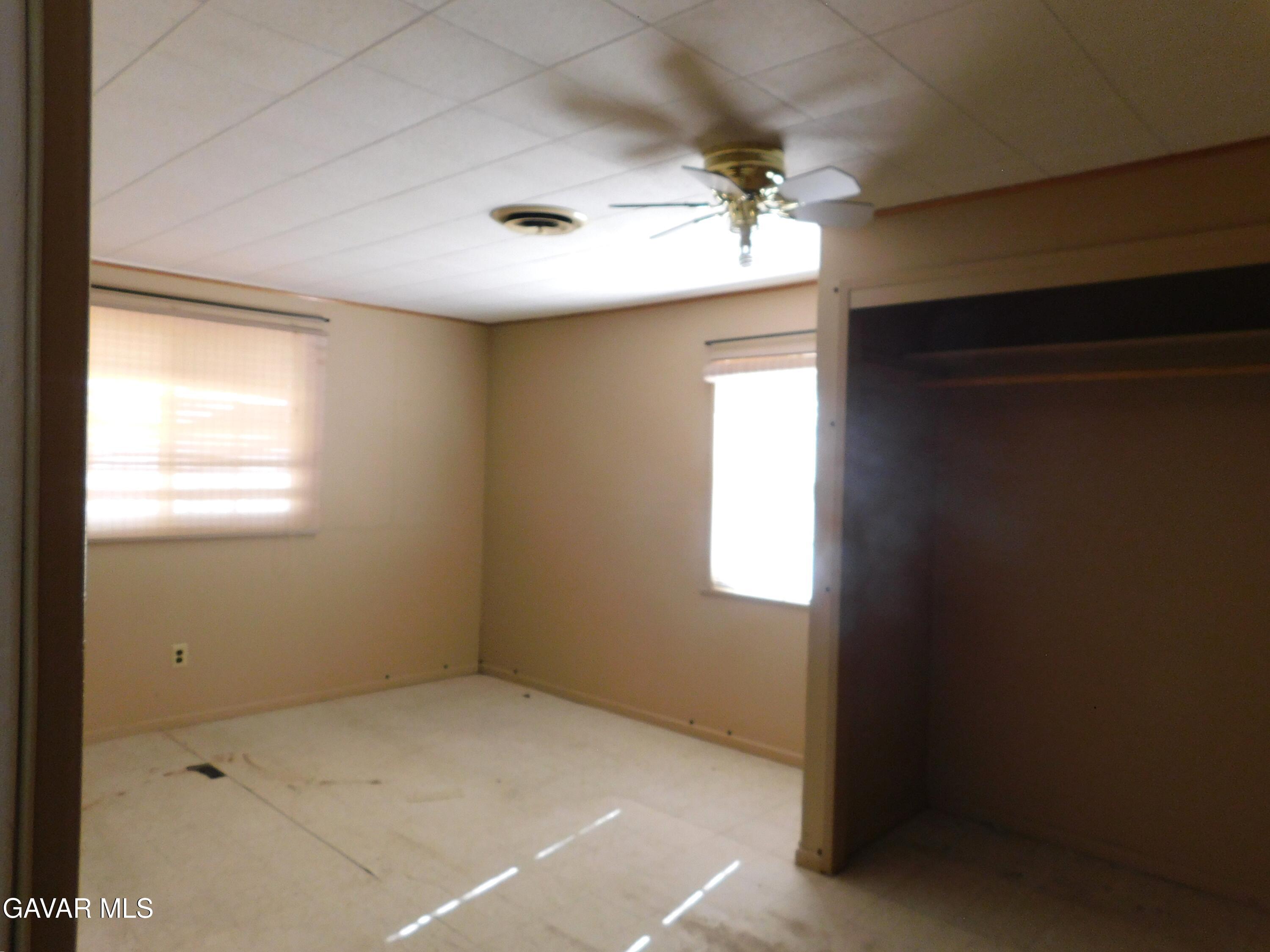 16873 Alexander Avenue Edwards, CA 93523 - Photo 19 of 31 a view of an empty room with a window