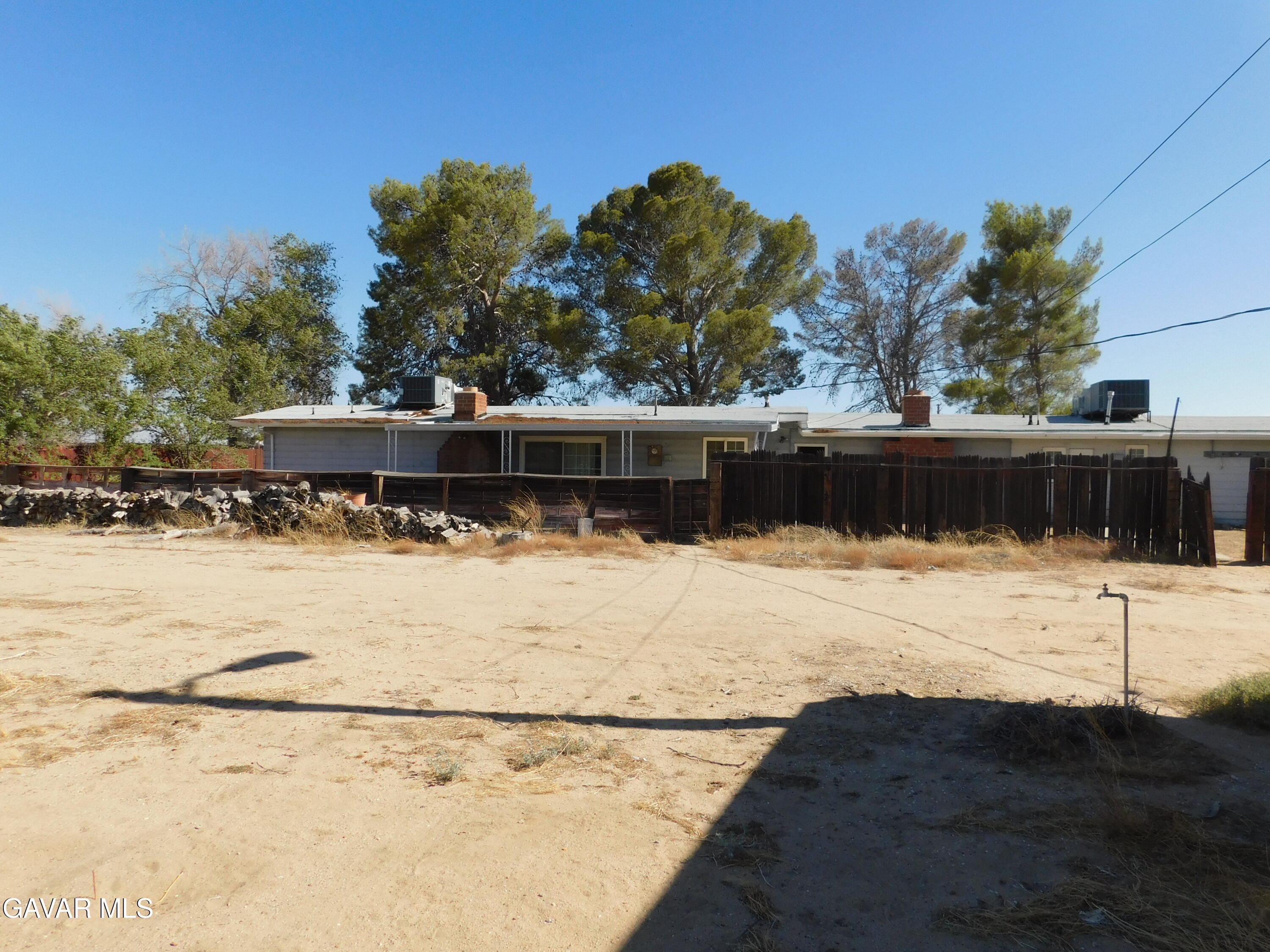 16873 Alexander Avenue Edwards, CA 93523 - Photo 27 of 31 a view of a swimming pool with a yard