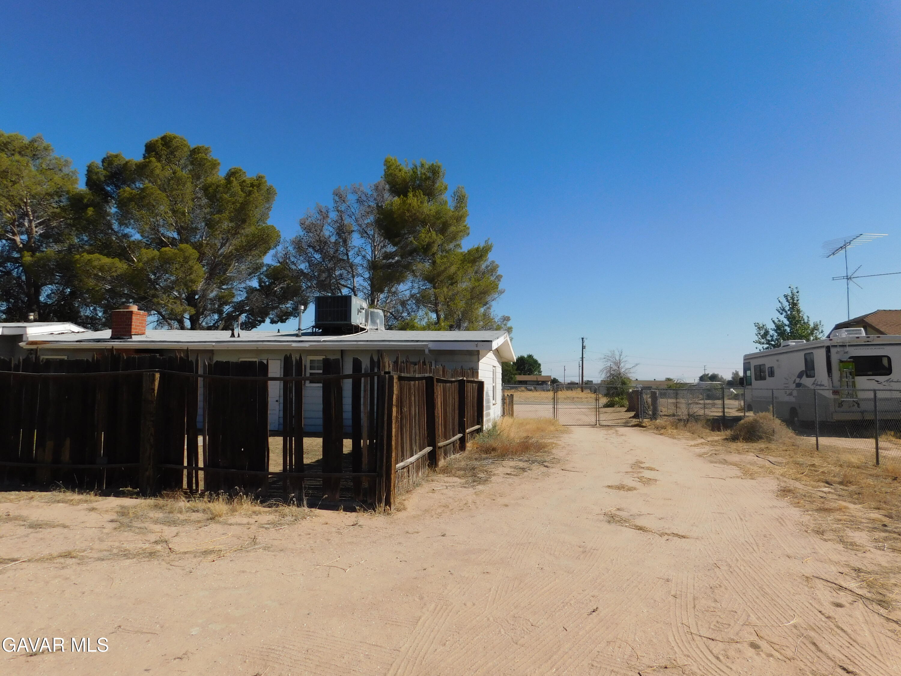 16873 Alexander Avenue Edwards, CA 93523 - Photo 28 of 31 a view of a house with a snow in the yard