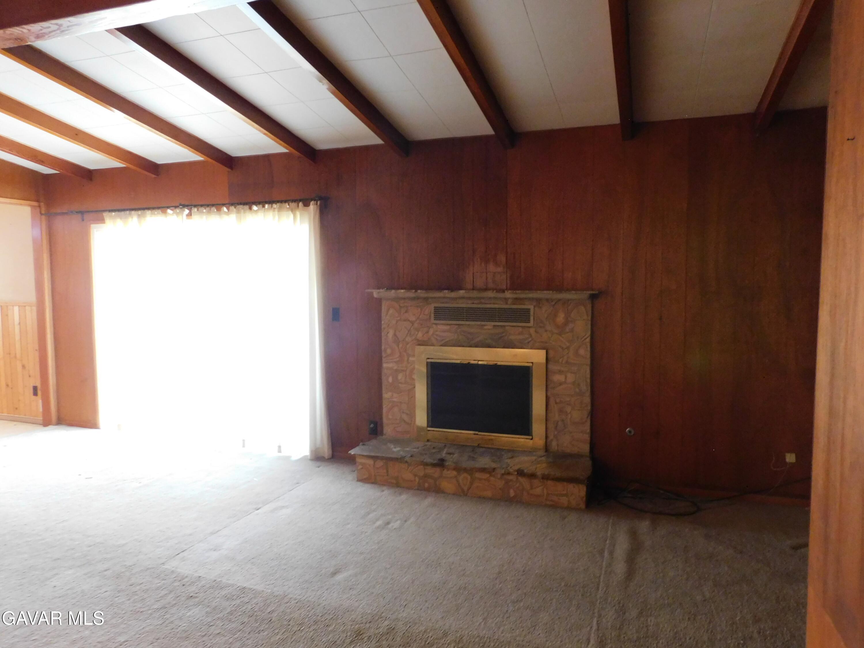 16873 Alexander Avenue Edwards, CA 93523 - Photo 8 of 31 a view of empty room with a fireplace