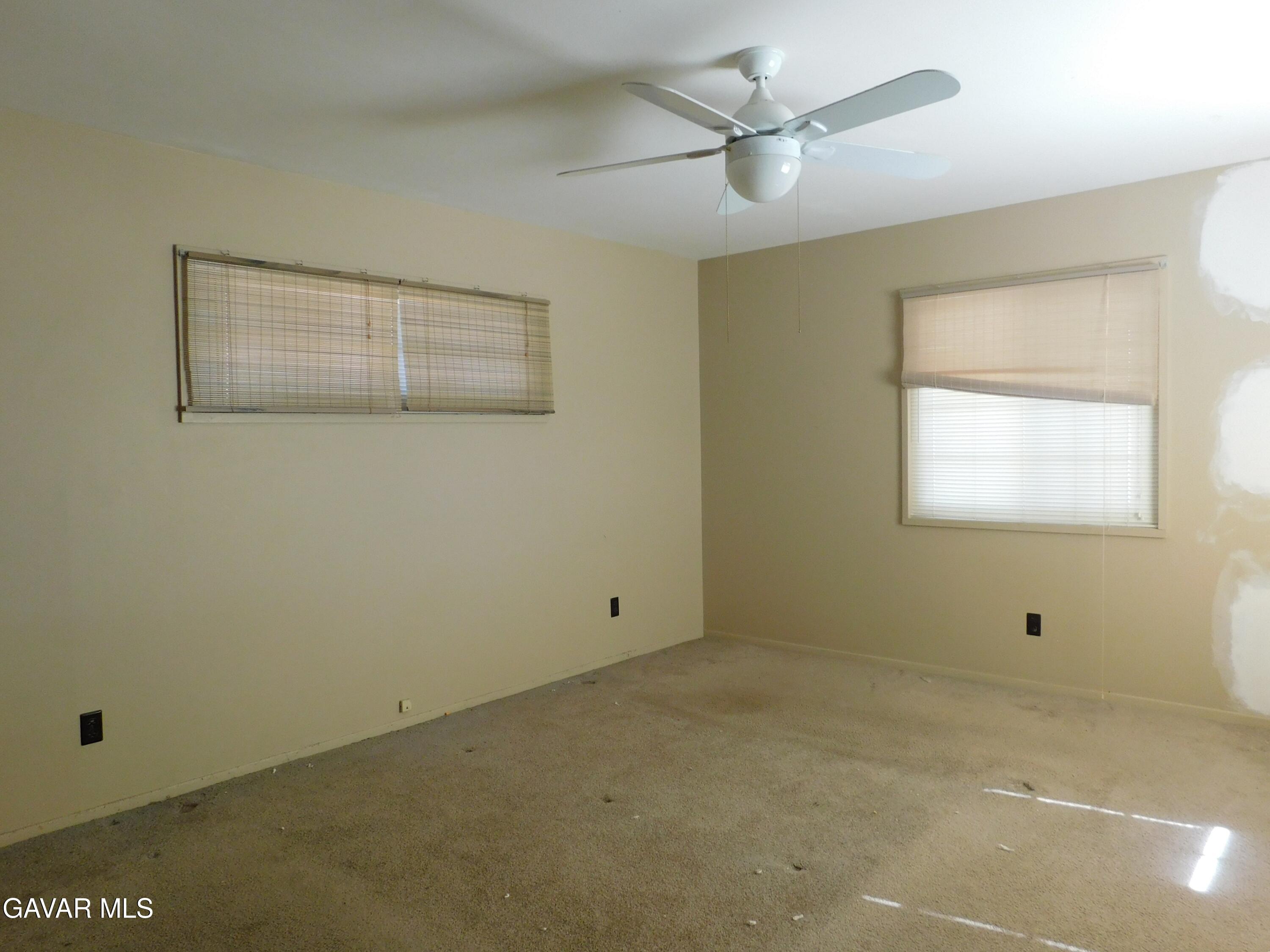 16873 Alexander Avenue Edwards, CA 93523 - Photo 9 of 31 a view of an empty room with a window
