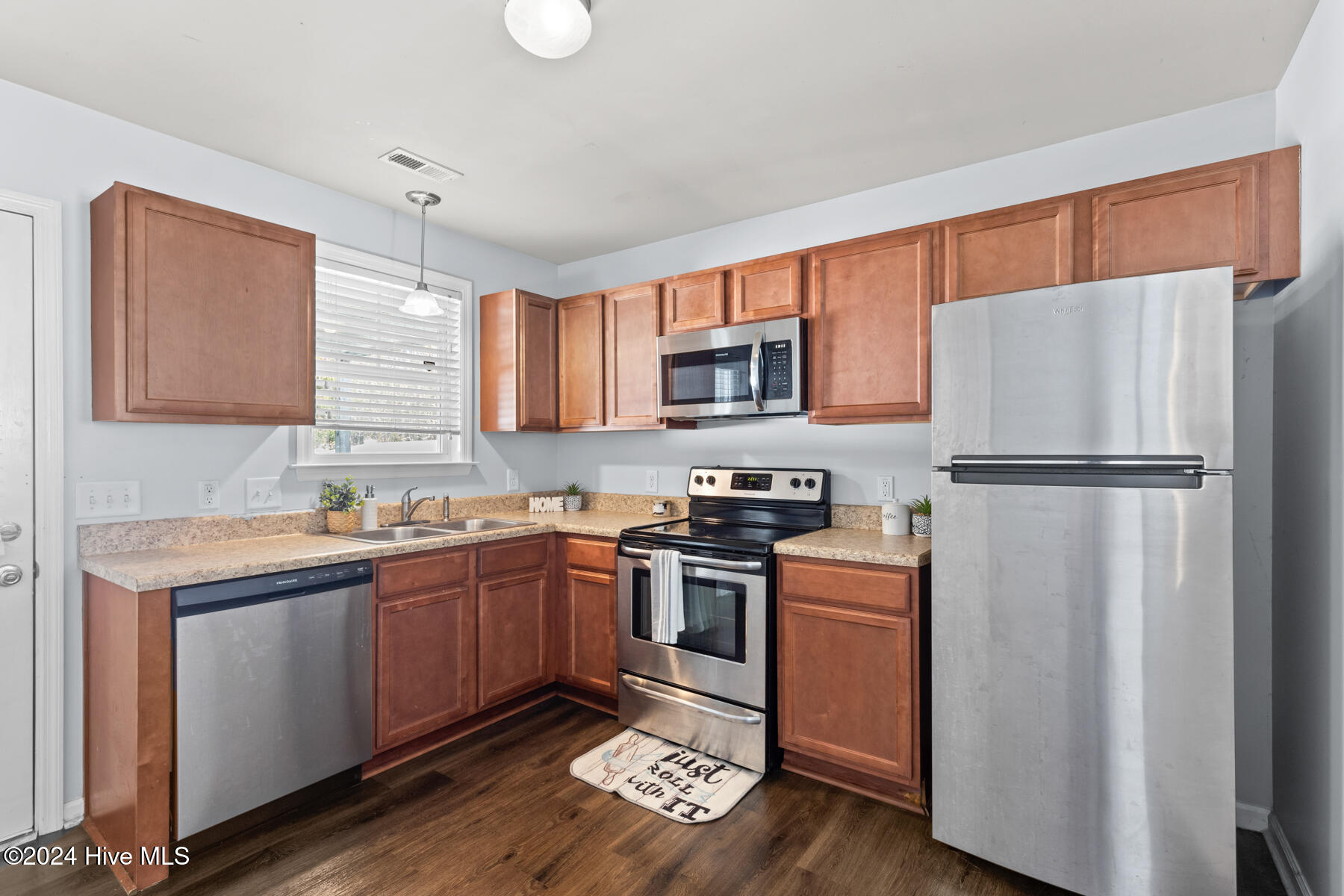 228 Caldwell Loop Jacksonville, NC 28546 - Photo 9 of 24 Kitchen with stainless steel appliances!