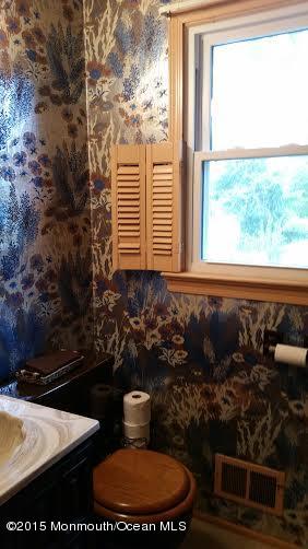 51 Hidden Stream Road Freehold, NJ 07728 - Photo 12 of 21 a bathroom with a toilet sink and window