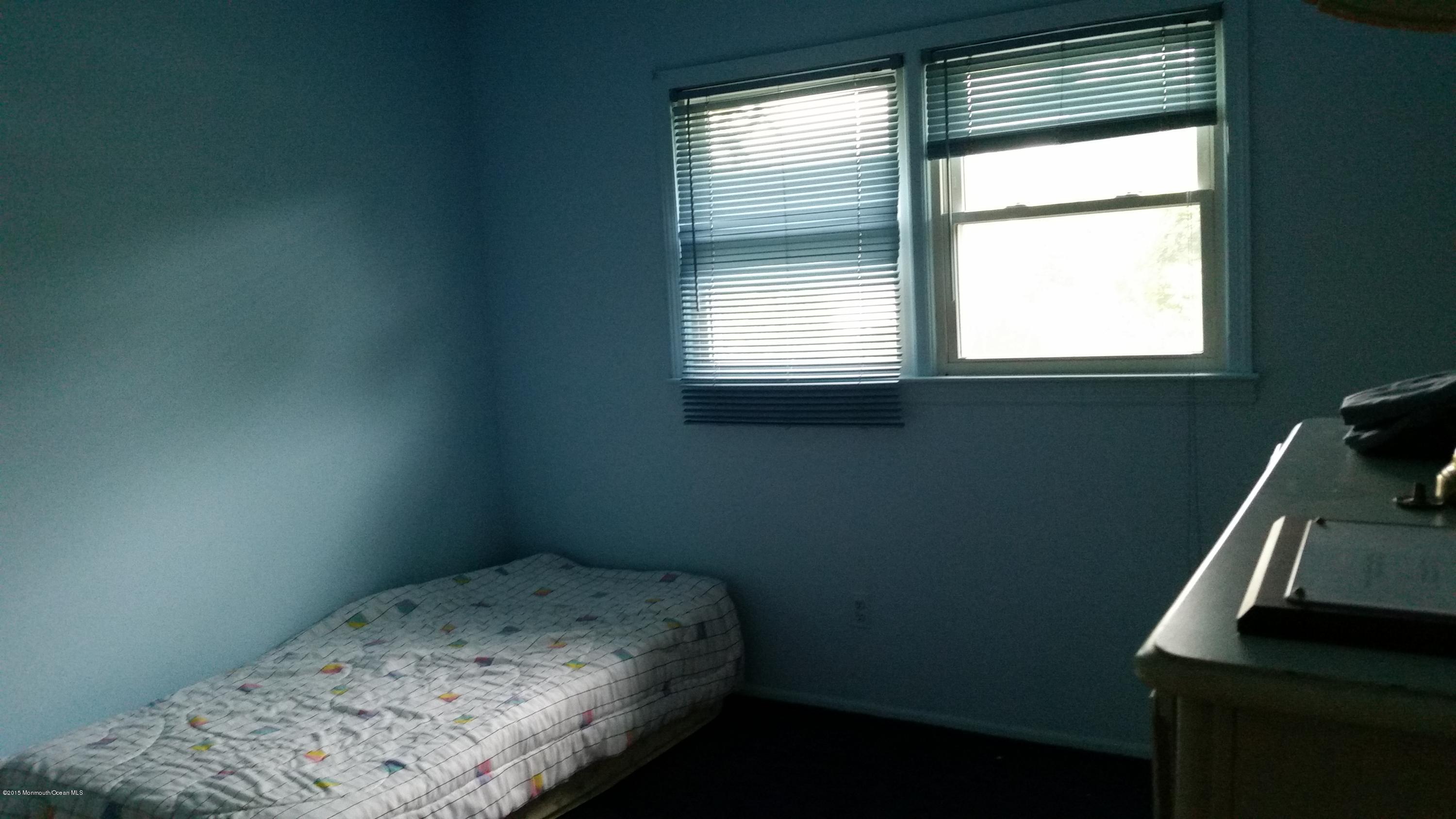 51 Hidden Stream Road Freehold, NJ 07728 - Photo 15 of 21 a bedroom with a bed and a window