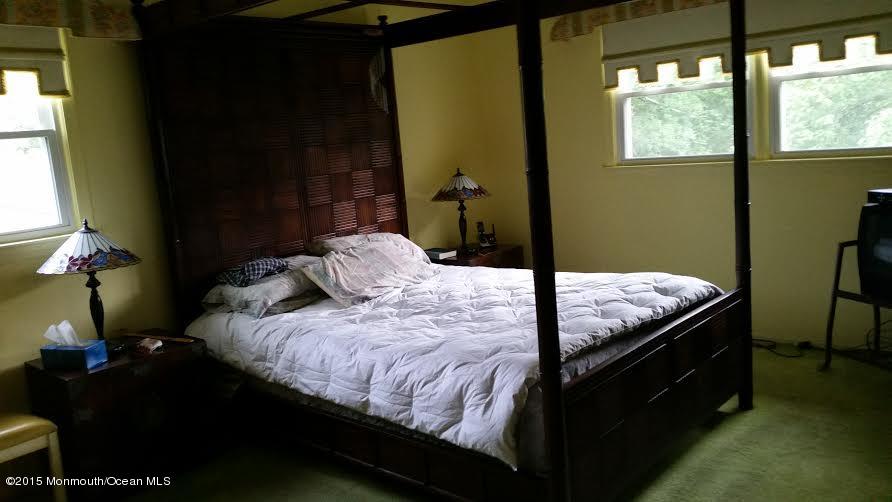 51 Hidden Stream Road Freehold, NJ 07728 - Photo 17 of 21 a bedroom with a bed and a window