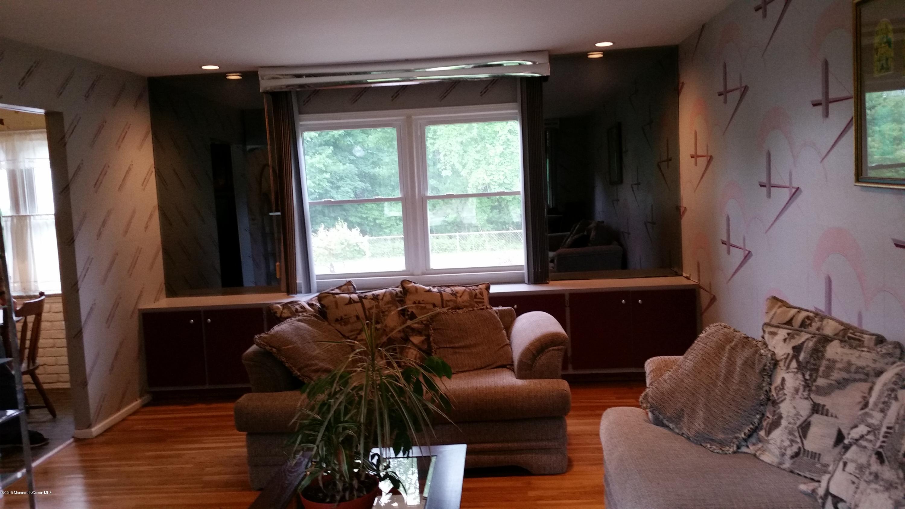 51 Hidden Stream Road Freehold, NJ 07728 - Photo 8 of 21 a living room with furniture and a window