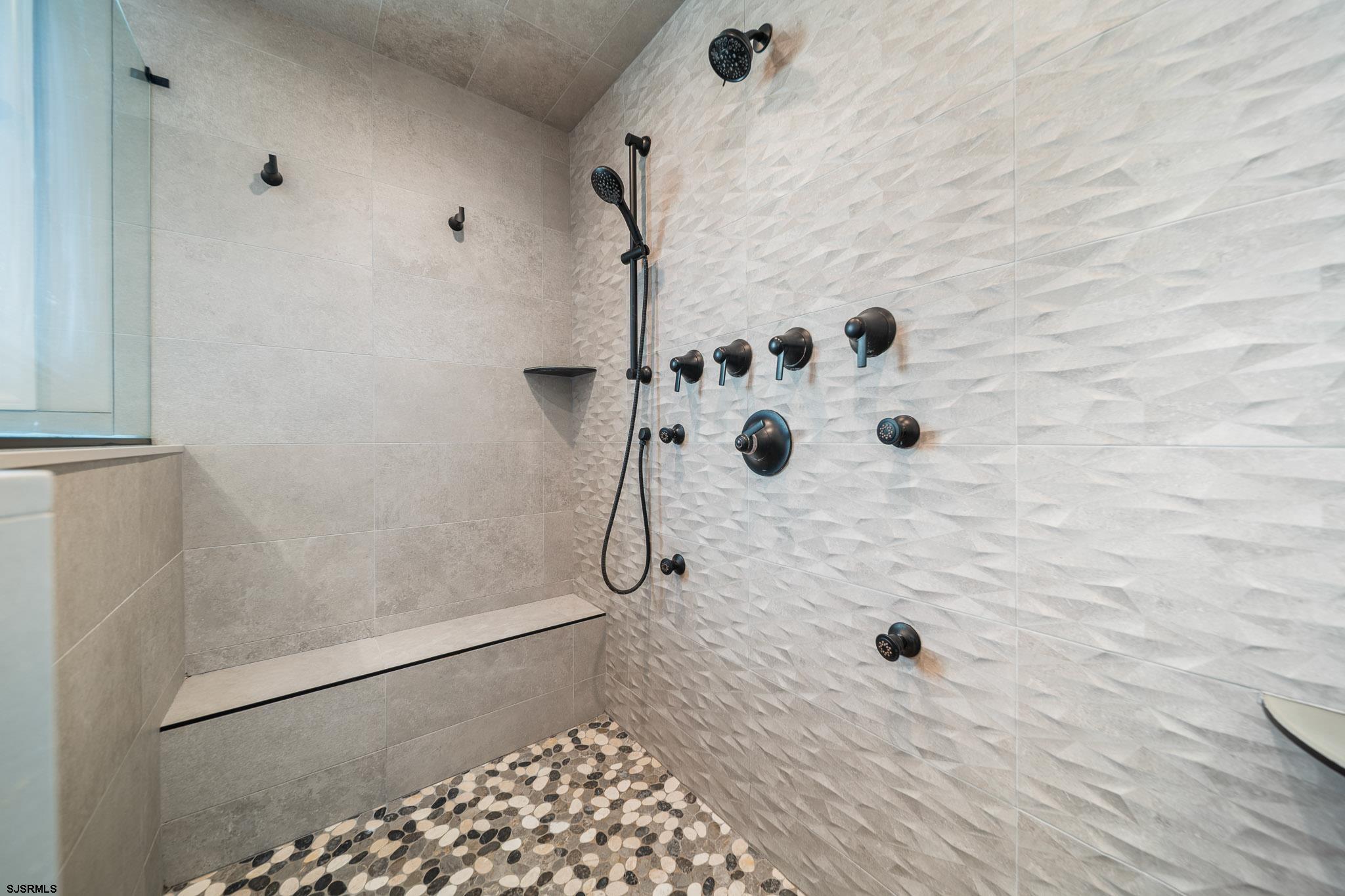 223 8th Street South Brigantine, NJ 08203 - Photo 20 of 46 a bathroom with a shower