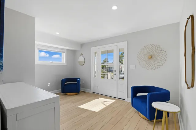 a bedroom with a bed and a chair