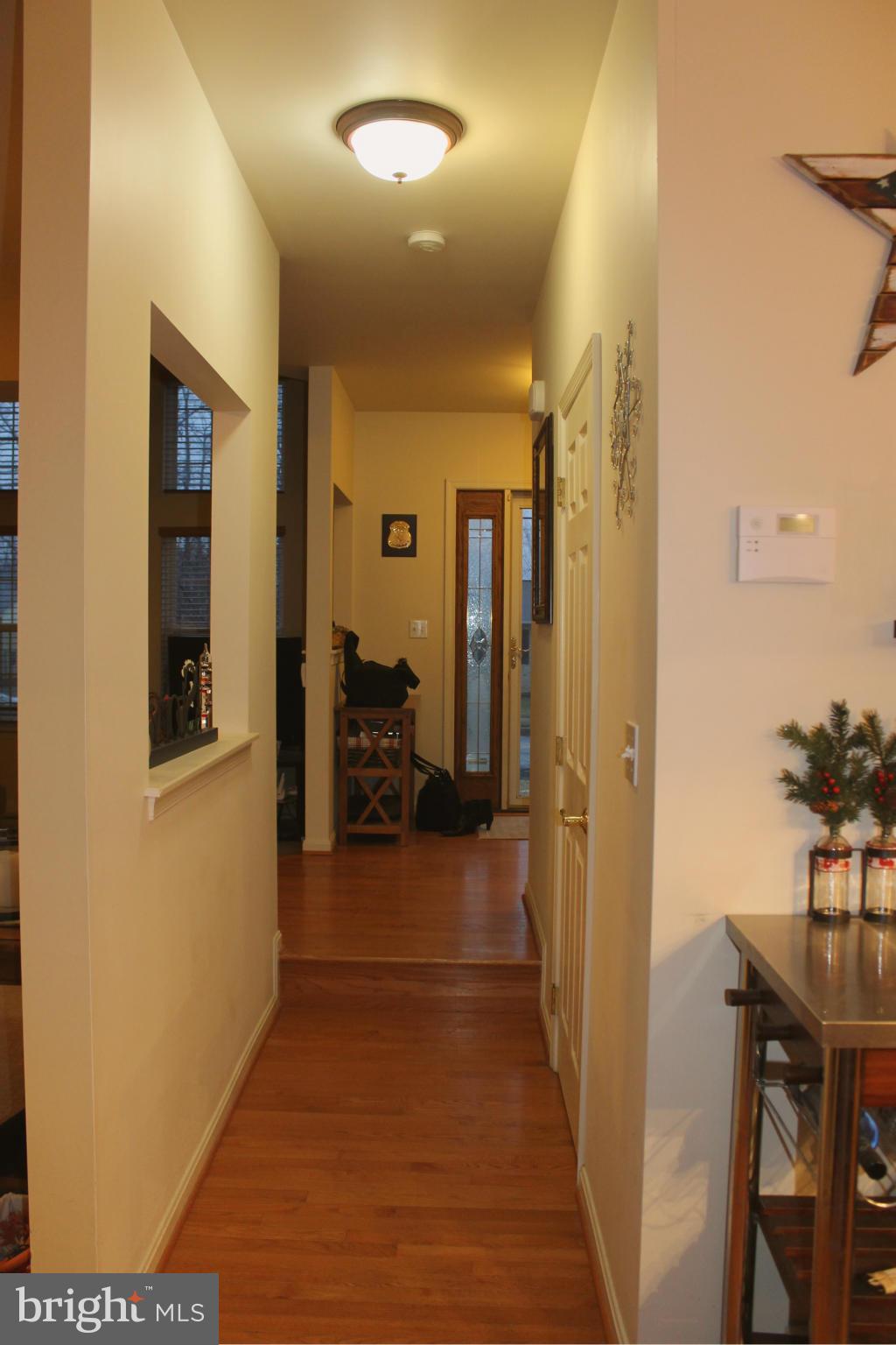 2416 Lodge Farm Road Baltimore, MD 21219 - Photo 3 of 12 a view of a hallway with a livingroom and a bathroom
