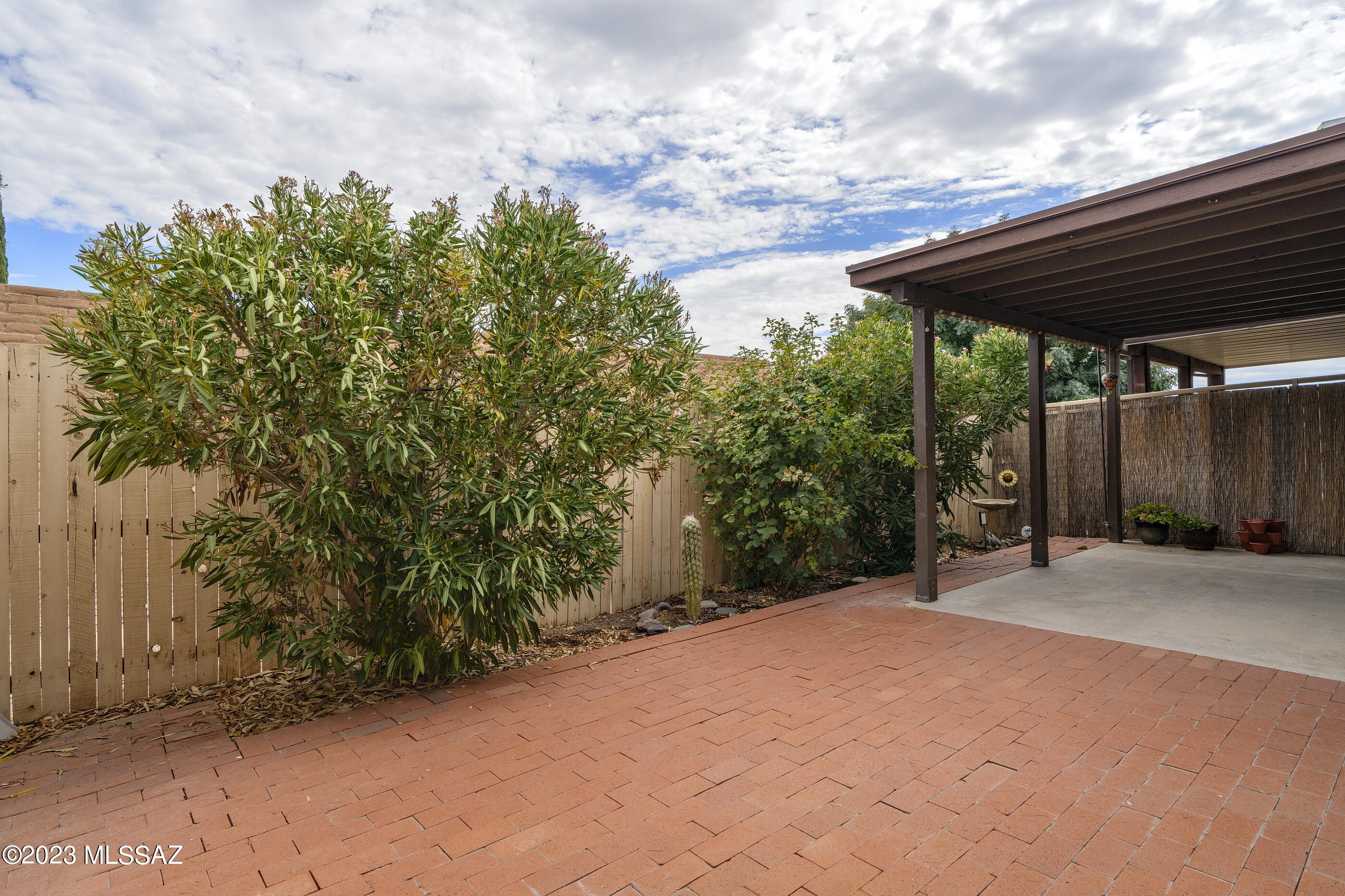 670 South Pantano Road, Unit E Tucson, AZ 85710 - Photo 17 of 17 a backyard of a house with lots of green space