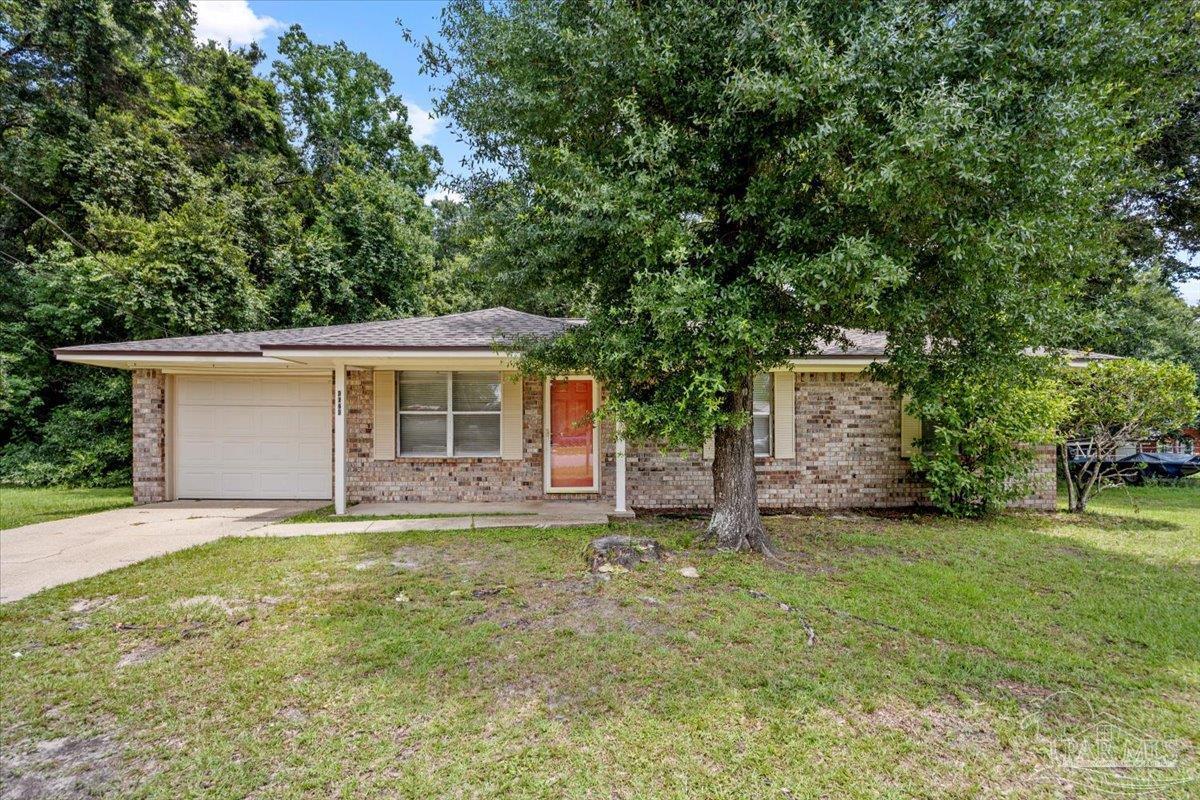 front view of a house with a yard