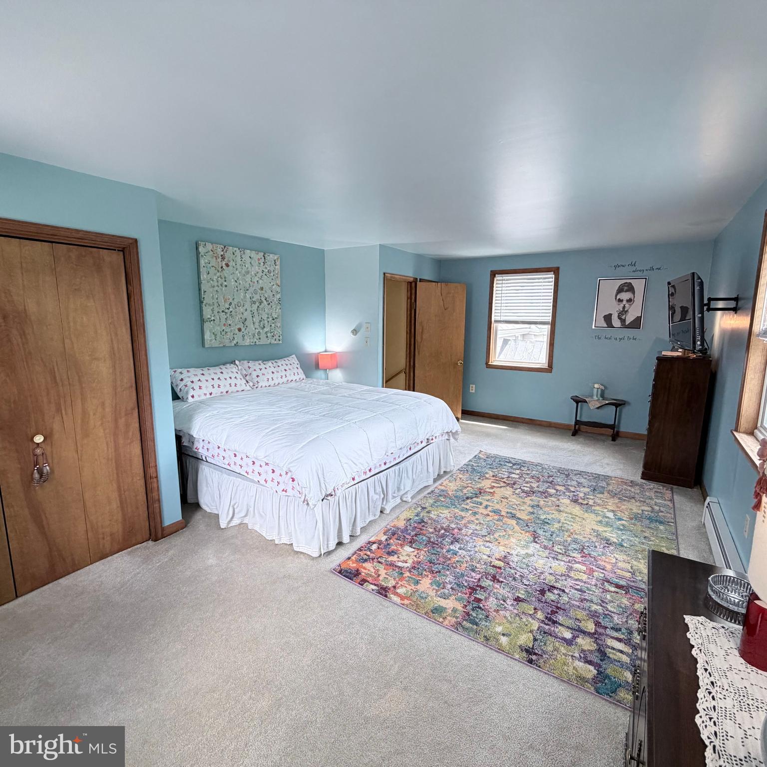 12997 Main Street Fort Loudon, PA 17224 - Photo 29 of 48 a bedroom with a bed and wooden floor
