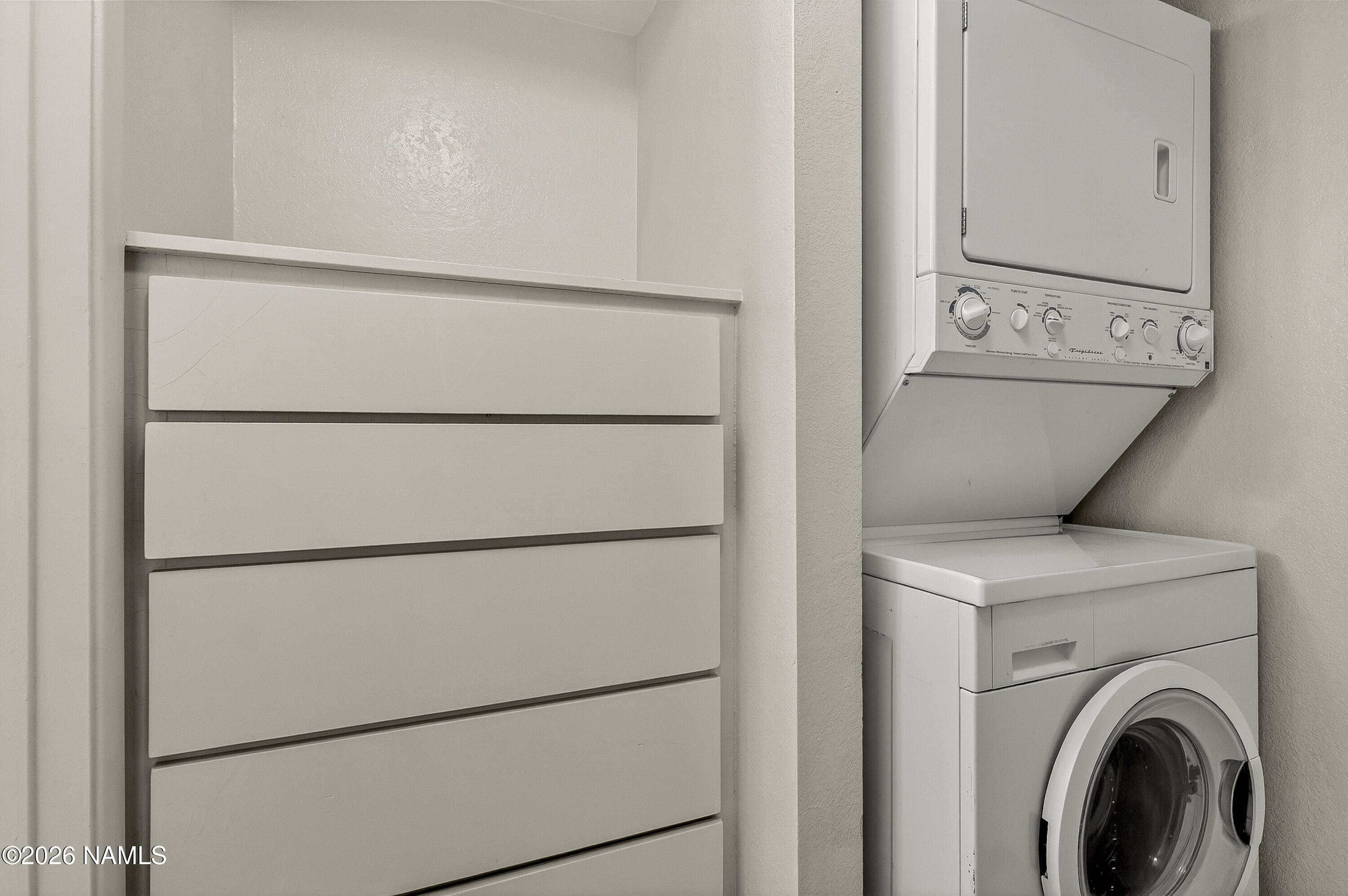 1200 South Riordan Ranch Street, Unit 112 Flagstaff, AZ 86001 - Photo 17 of 22 a view of washer and dryer