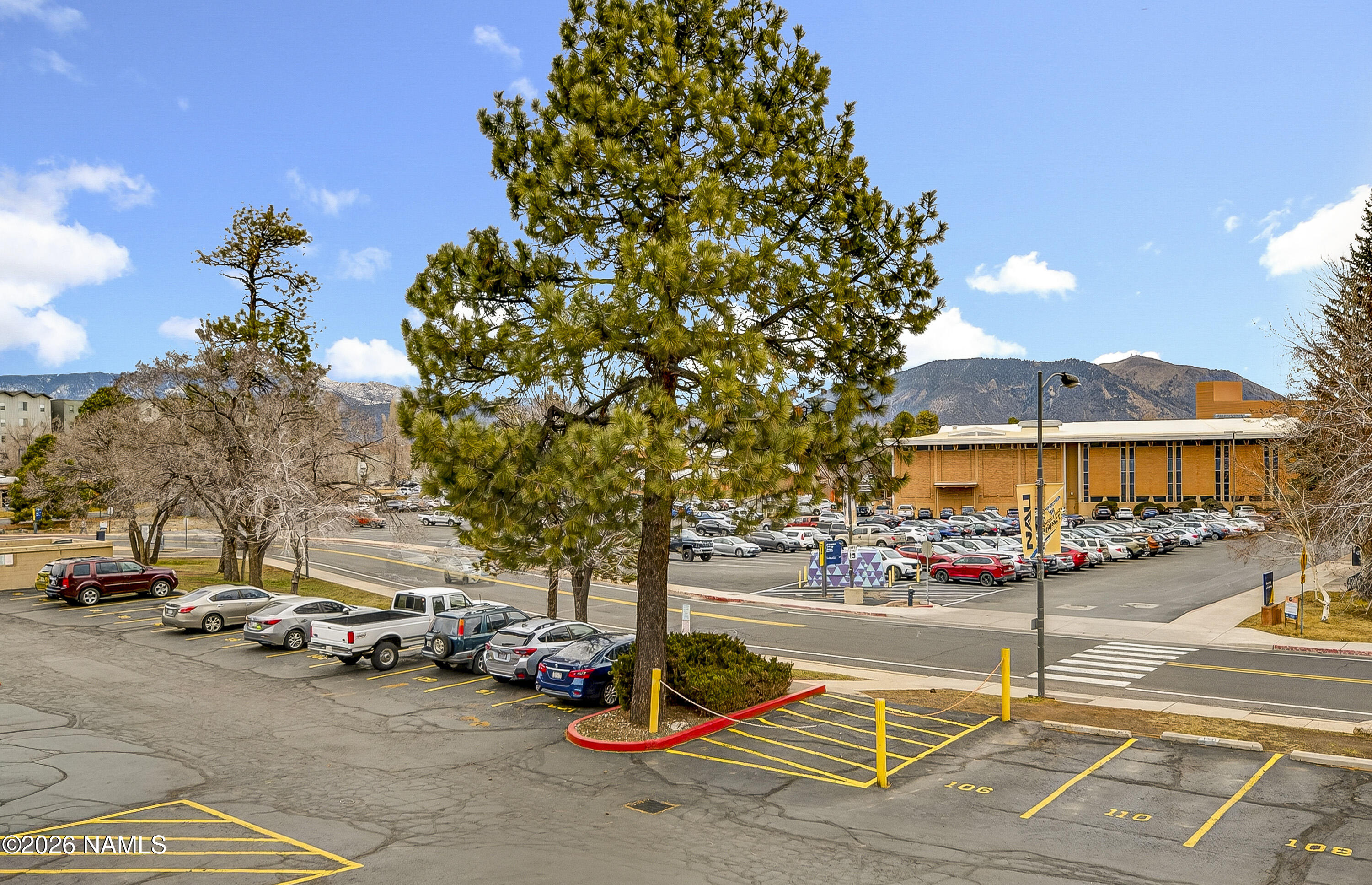 1200 South Riordan Ranch Street, Unit 112 Flagstaff, AZ 86001 - Photo 19 of 22 a view of a street with cars