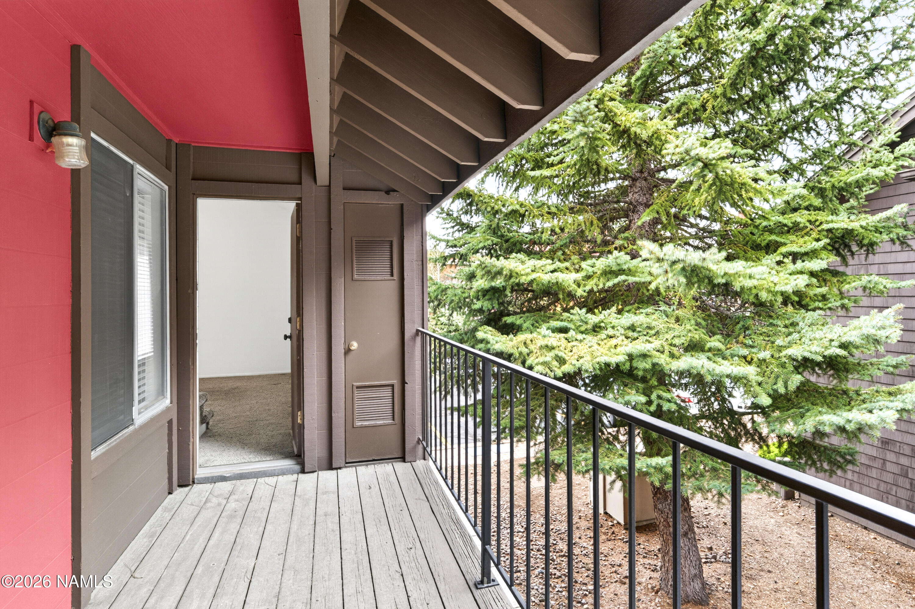 1200 South Riordan Ranch Street, Unit 112 Flagstaff, AZ 86001 - Photo 3 of 22 a view of balcony with wooden floor