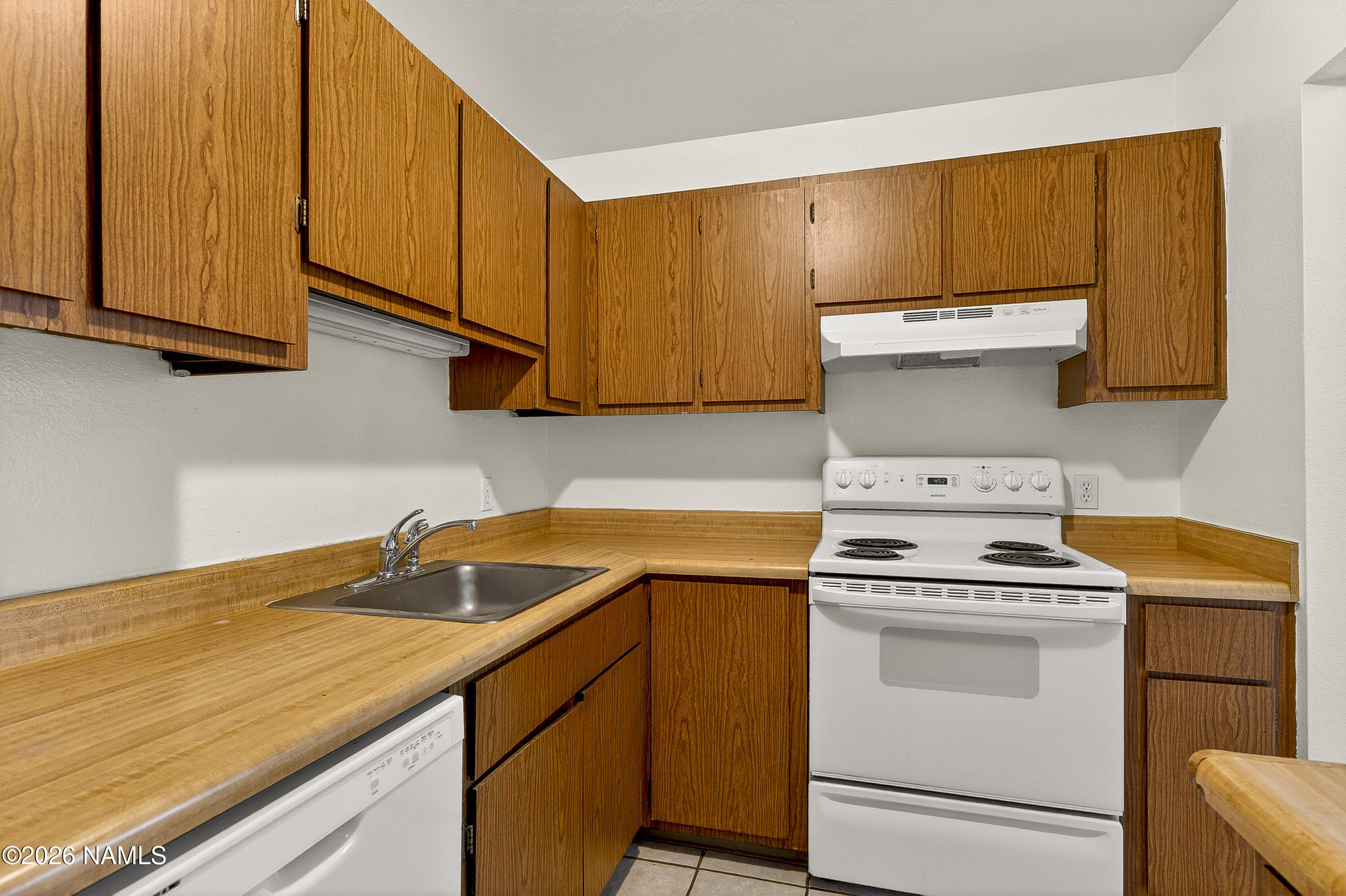 1200 South Riordan Ranch Street, Unit 112 Flagstaff, AZ 86001 - Photo 6 of 22 a utility room with dryer and washer
