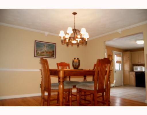 169 Lonsdale Farm Road Cumberland, RI 02864 - Photo 2 of 12 Dining Room. Subtle lighting sets the tone for this peaceful dining room complete with chair rail accents, crown moldings, and keystone accents. Gleaming hardwoods, open to kitchen, pleasant, warm hues throughout