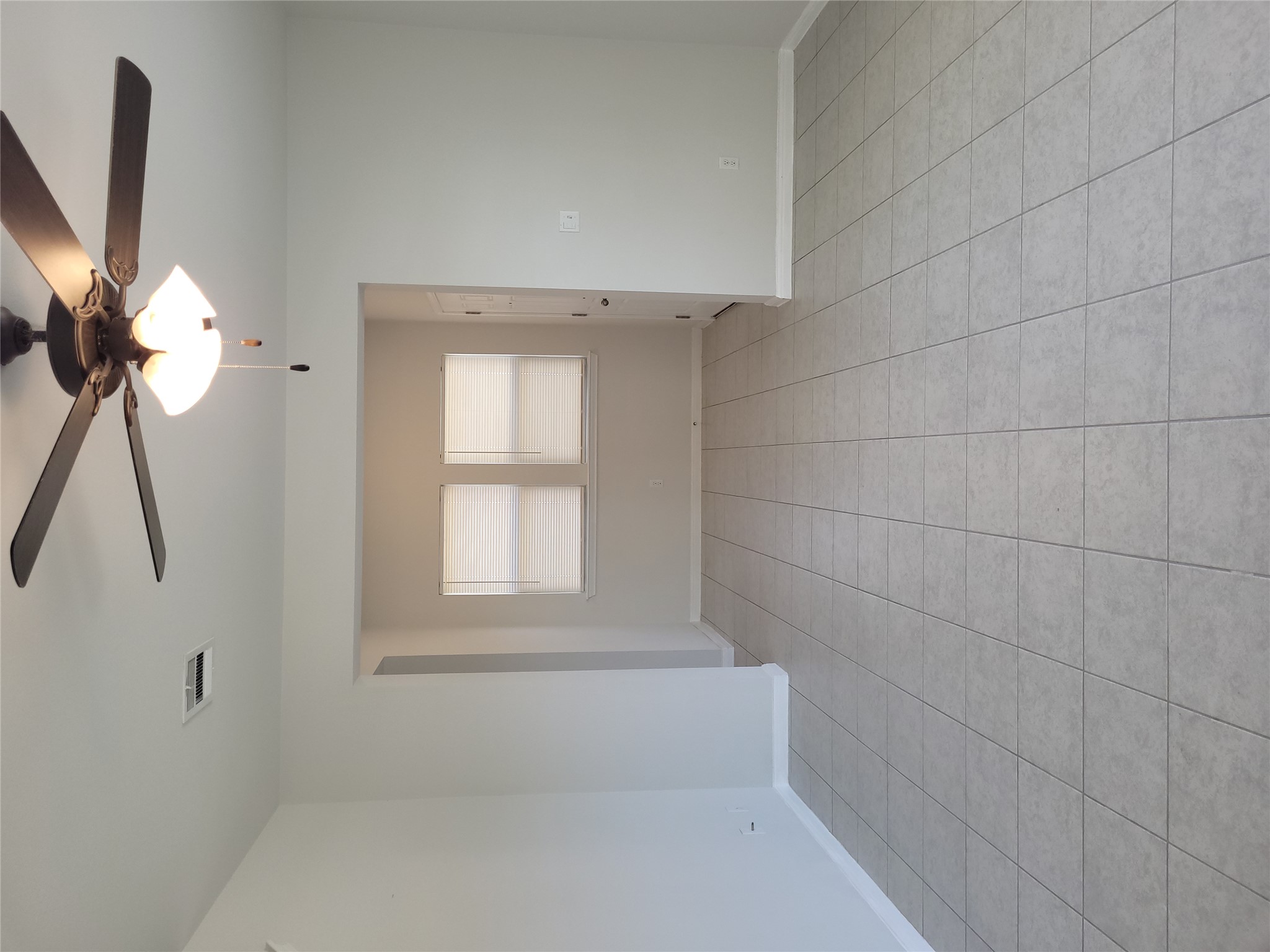 8308 Daisy Cutter Crossing Georgetown, TX 78626 - Photo 3 of 27 A versatile living area with cool tile flooring and abundant natural light offers comfortable daily living.