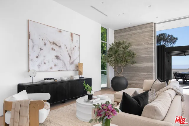 a kitchen with stainless steel appliances kitchen island granite countertop a sink and cabinets