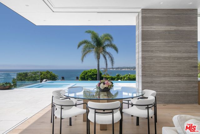 a bedroom with a bed and a cabinet