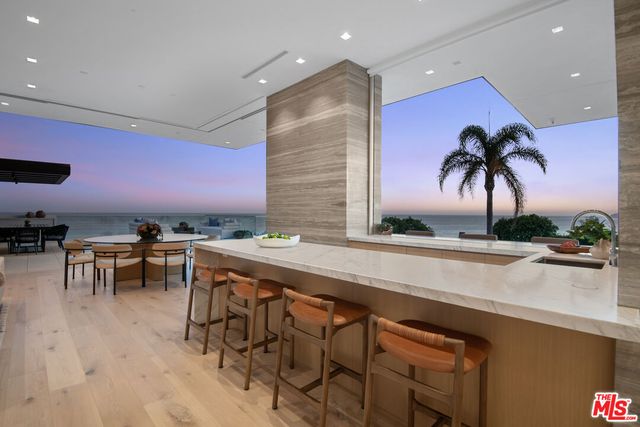 a bathroom with a sink and a shower