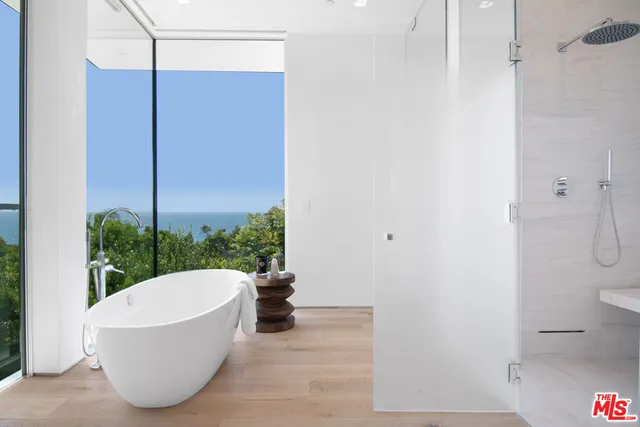 a dinning table sitting in a kitchen next to a window
