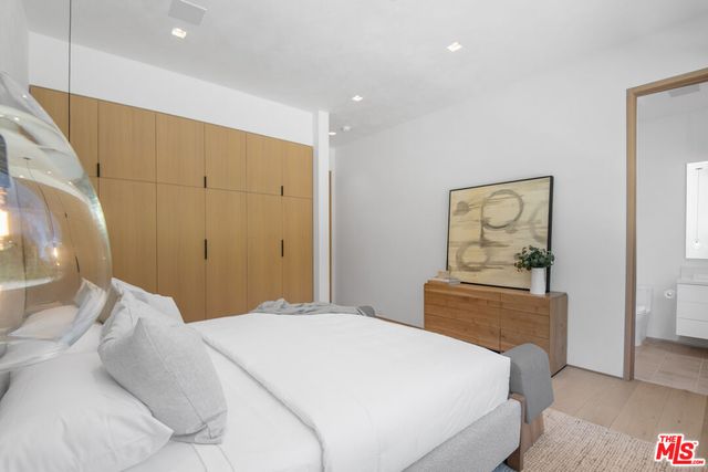 a view of a room that has a table and chairs