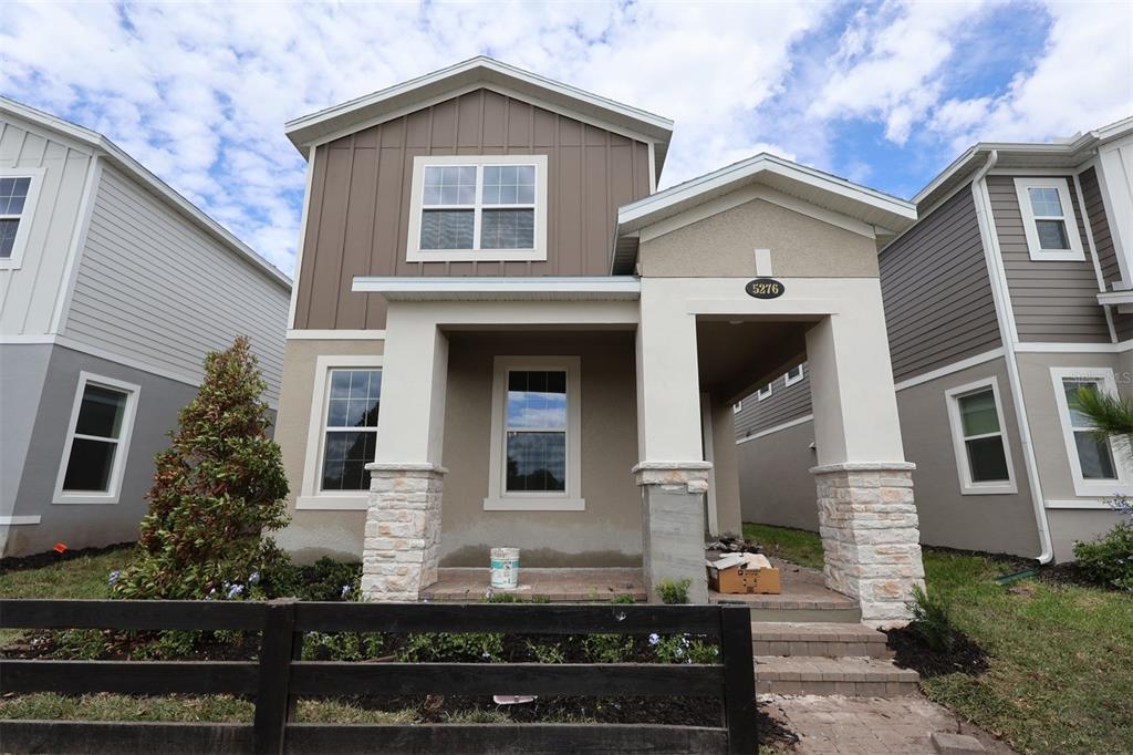 5276 Ctr Lk Rnch Boulevard St. Cloud, FL 34771 - Photo 1 of 23 front view of house with a yard