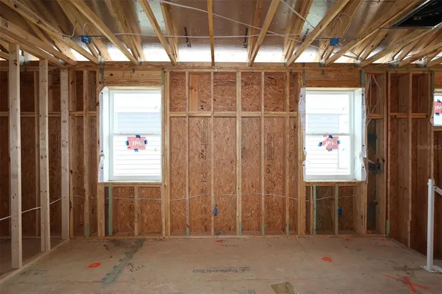 a view of a porch with a door and a glass door
