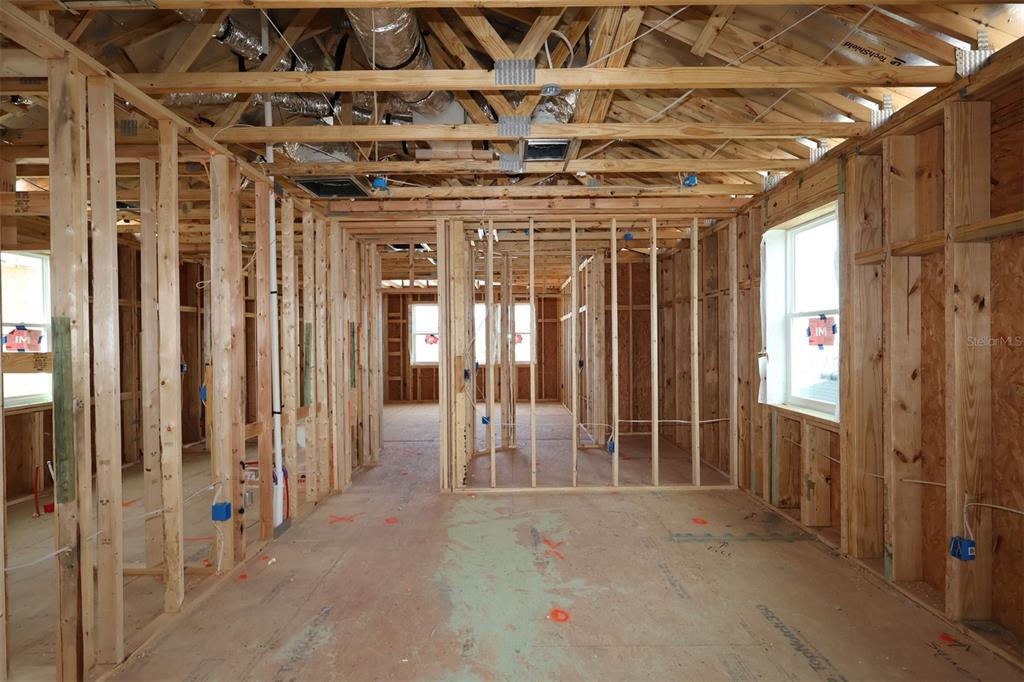5276 Ctr Lk Rnch Boulevard St. Cloud, FL 34771 - Photo 17 of 30 a view of a porch with a table and chairs