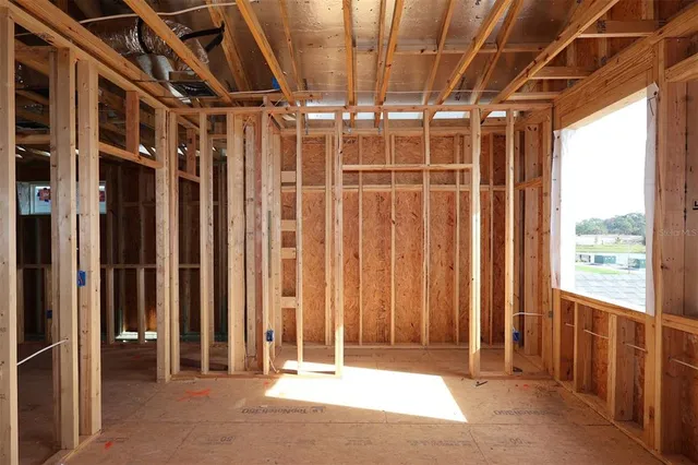 a view of a room with wooden walls