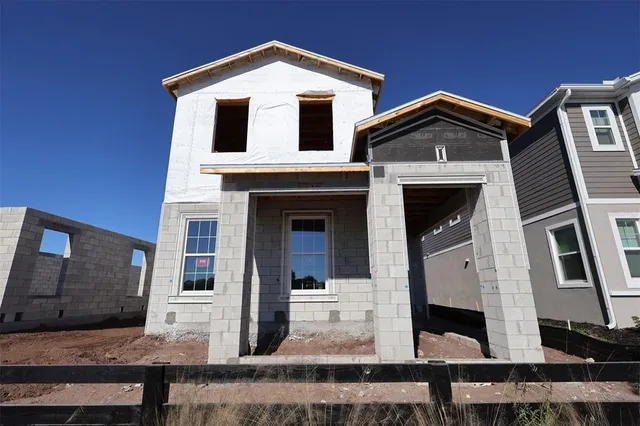a front view of a house with glass windows