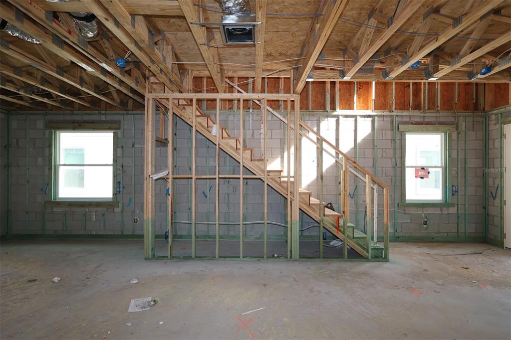 5276 Ctr Lk Rnch Boulevard St. Cloud, FL 34771 - Photo 23 of 30 a view of an empty room with a staircase