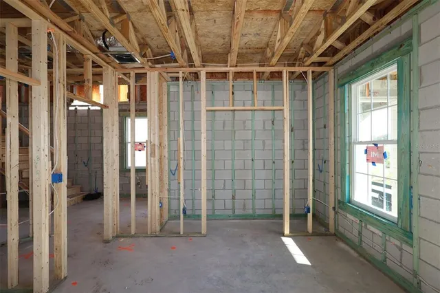 a view of entryway with wooden door