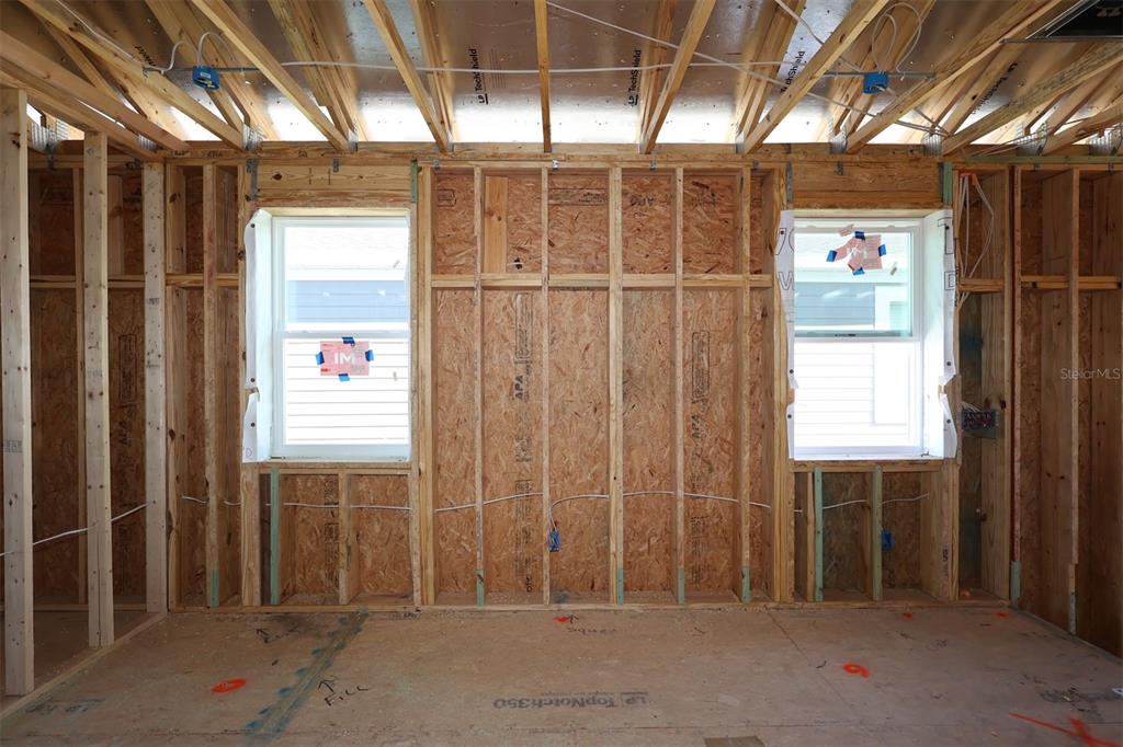 5276 Ctr Lk Rnch Boulevard St. Cloud, FL 34771 - Photo 8 of 30 a view of an empty room with wooden walls