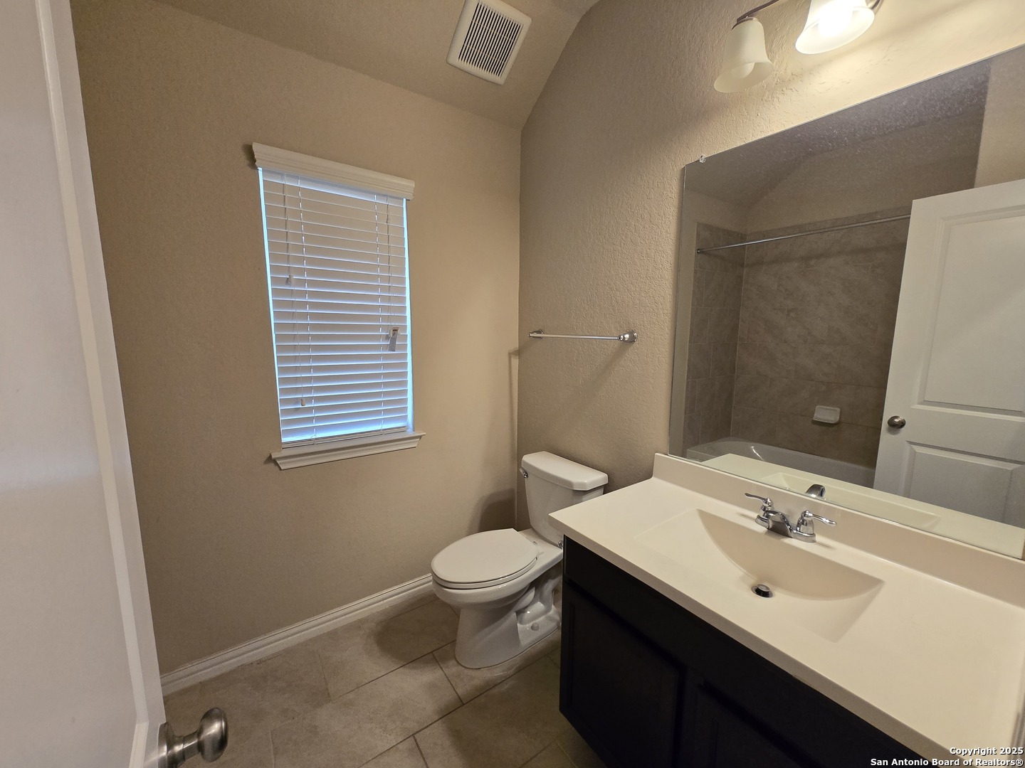 11518 Hanson's Forest Schertz, TX 78154 - Photo 23 of 26 a bathroom with a sink a toilet and mirror
