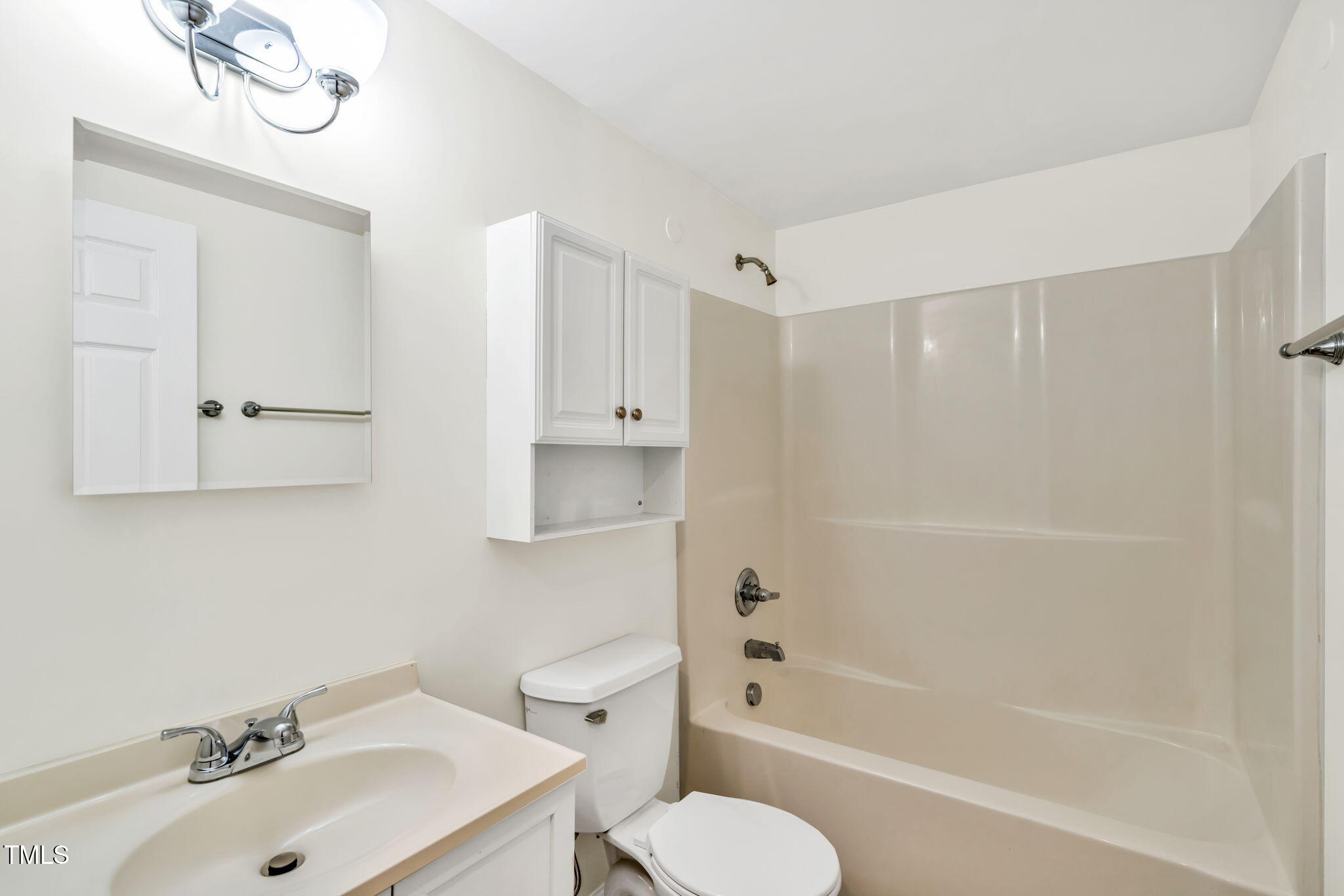 5500 Bobbitt Road Apex, NC 27539 - Photo 16 of 23 a bathroom with a sink toilet and shower