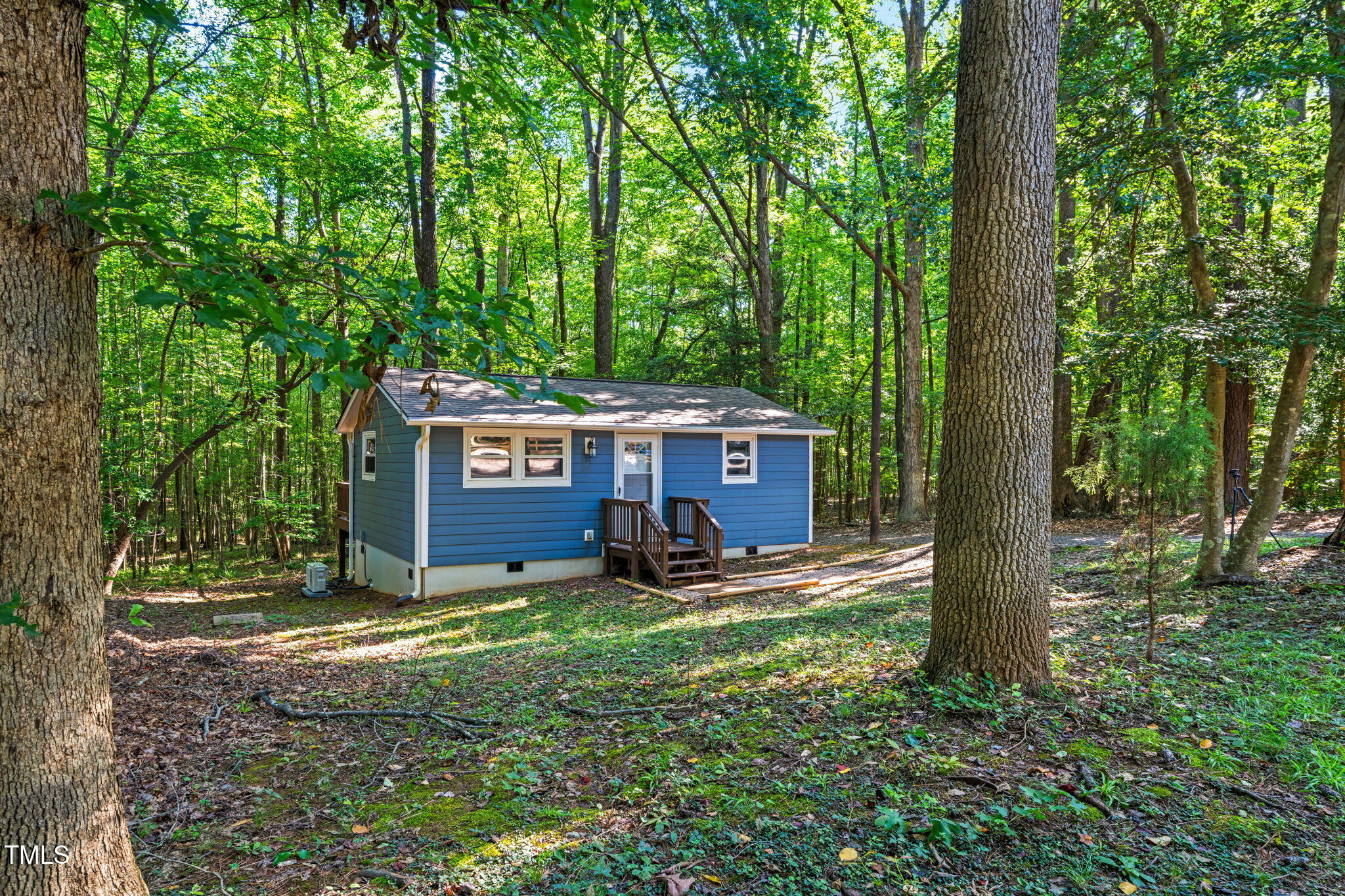 5500 Bobbitt Road Apex, NC 27539 - Photo 2 of 23 a view of a house with backyard