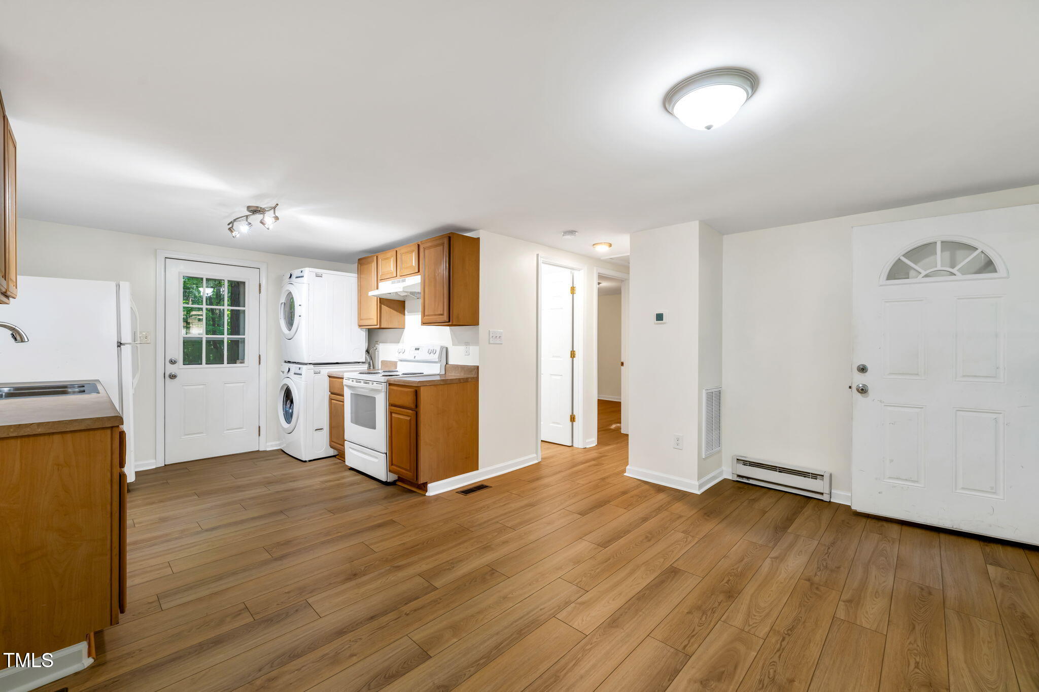 5500 Bobbitt Road Apex, NC 27539 - Photo 5 of 23 a view of kitchen with wooden floor