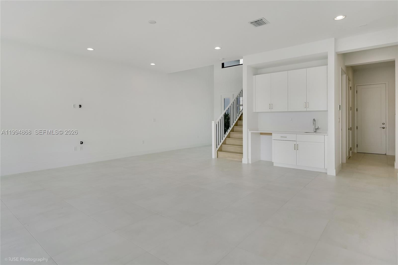 8095 Crystal Downs Avenue Boca Raton, FL 33434 - Photo 12 of 26 an empty room with white walls and white walls