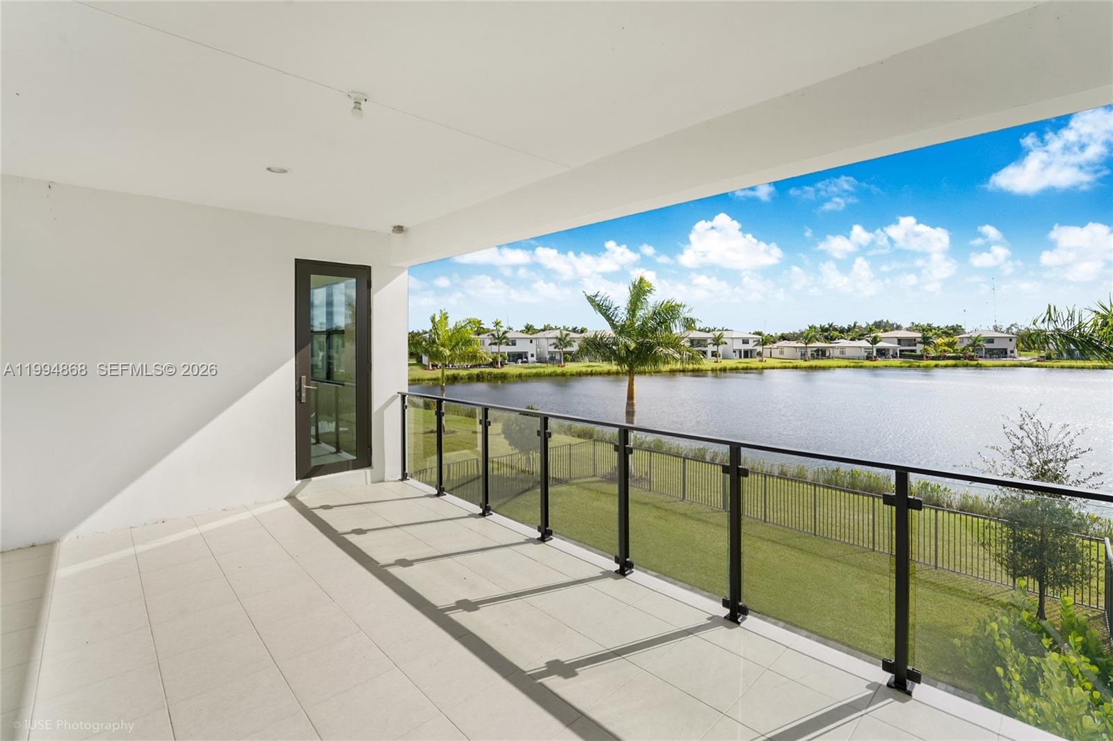 8095 Crystal Downs Avenue Boca Raton, FL 33434 - Photo 21 of 26 a balcony with an ocean view