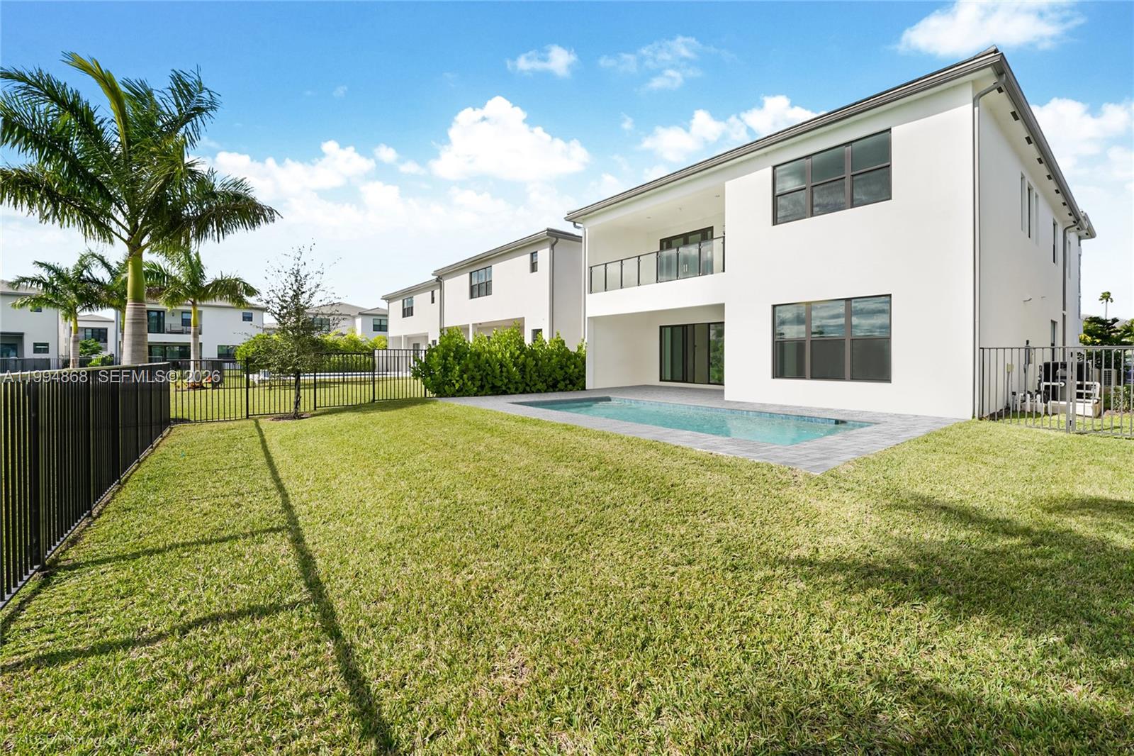 8095 Crystal Downs Avenue Boca Raton, FL 33434 - Photo 5 of 26 a view of a house with backyard and tree