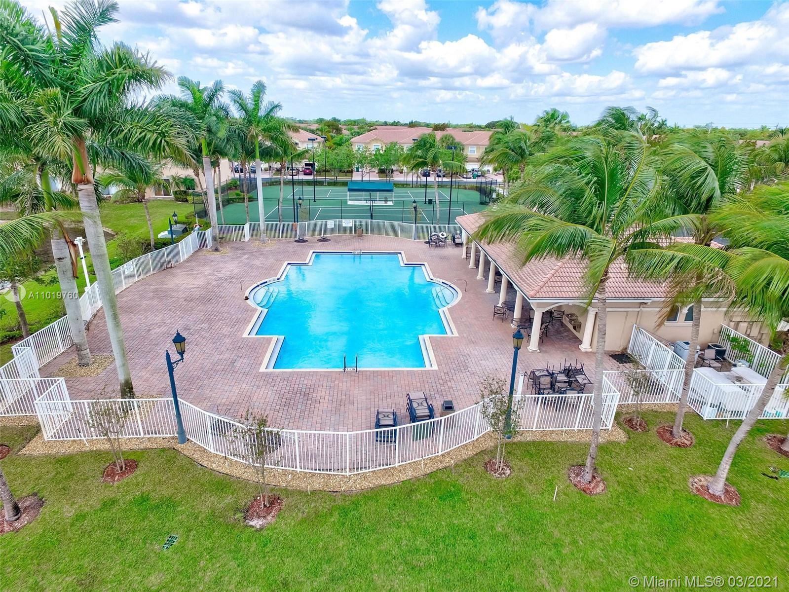 8437 Southwest 29th Street, Unit 102 Miramar, FL 33025 - Photo 27 of 29 an aerial view of a house with a yard