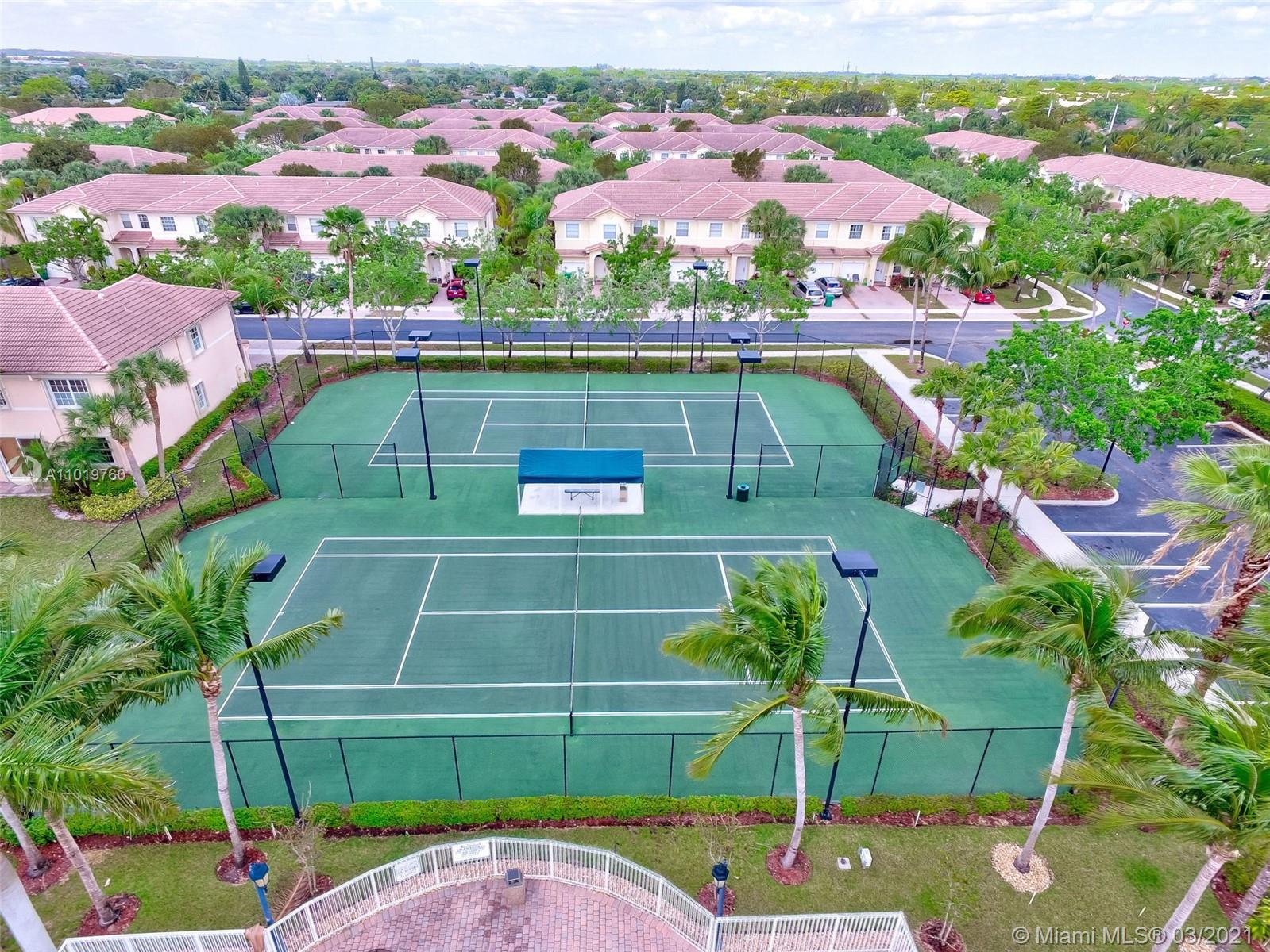 8437 Southwest 29th Street, Unit 102 Miramar, FL 33025 - Photo 28 of 29 an aerial view of a pool