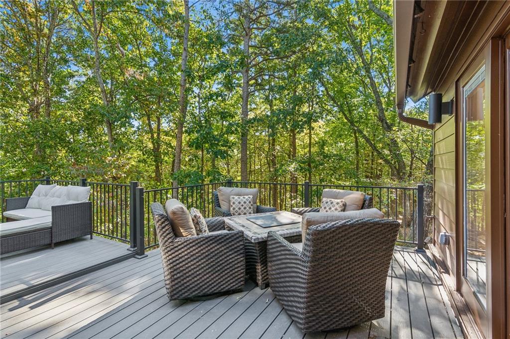 626 Petit Ridge Drive Big Canoe, GA 30143 - Photo 19 of 42 a view of a patio on the roof deck