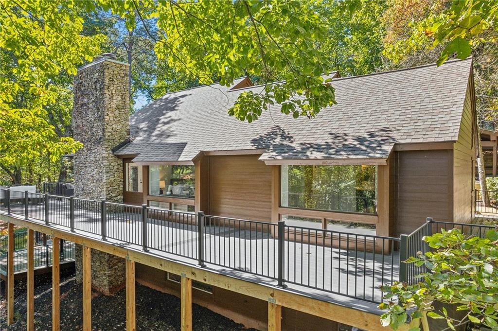626 Petit Ridge Drive Big Canoe, GA 30143 - Photo 21 of 42 a view of a house with a balcony