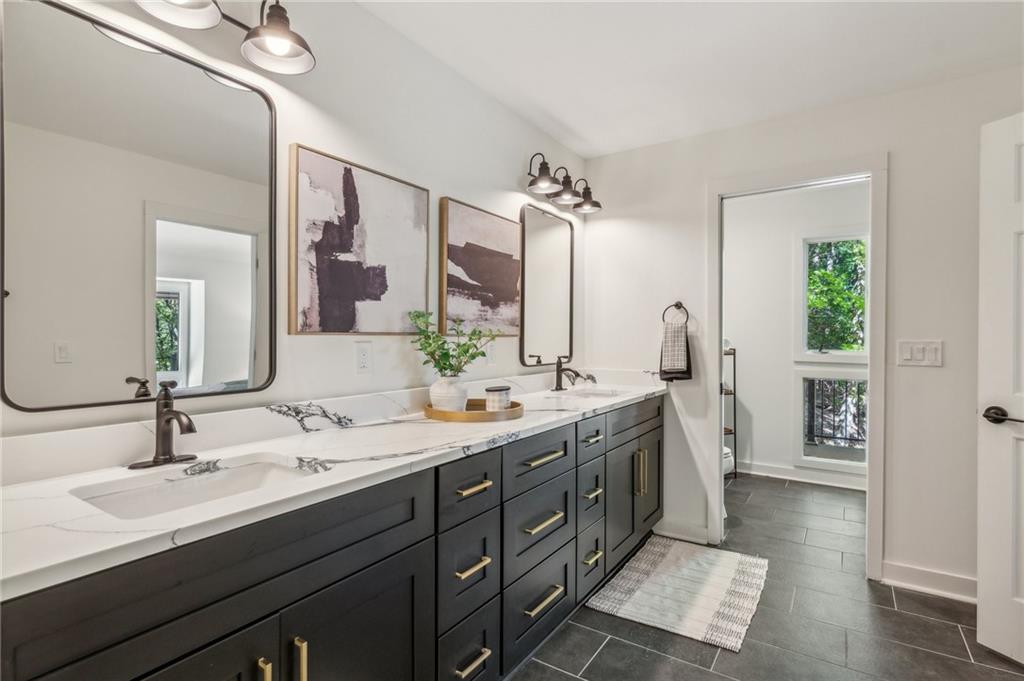 626 Petit Ridge Drive Big Canoe, GA 30143 - Photo 24 of 42 a bathroom with a double vanity sink mirror and double